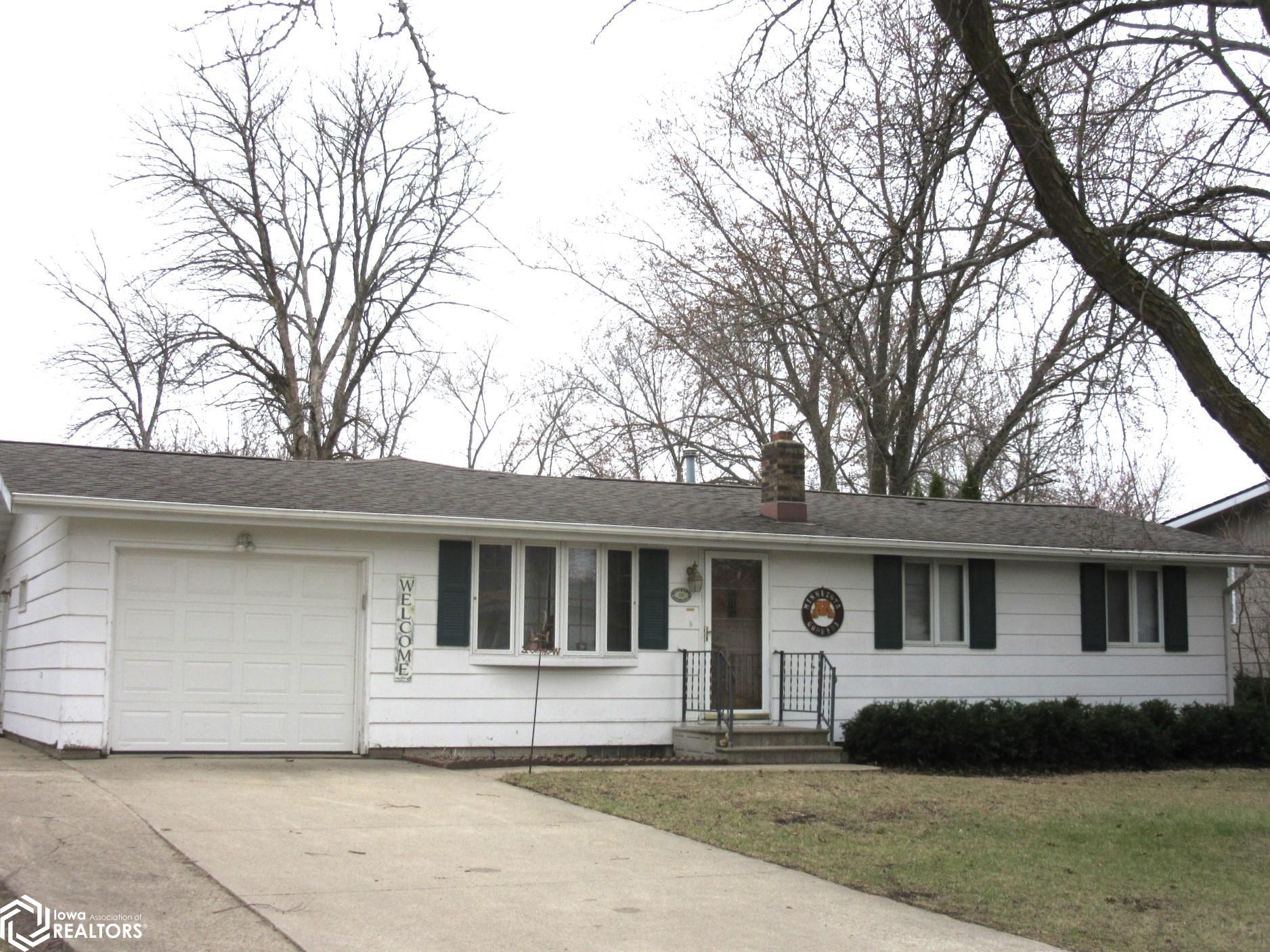 Single attached Garage with separate parking to the side.