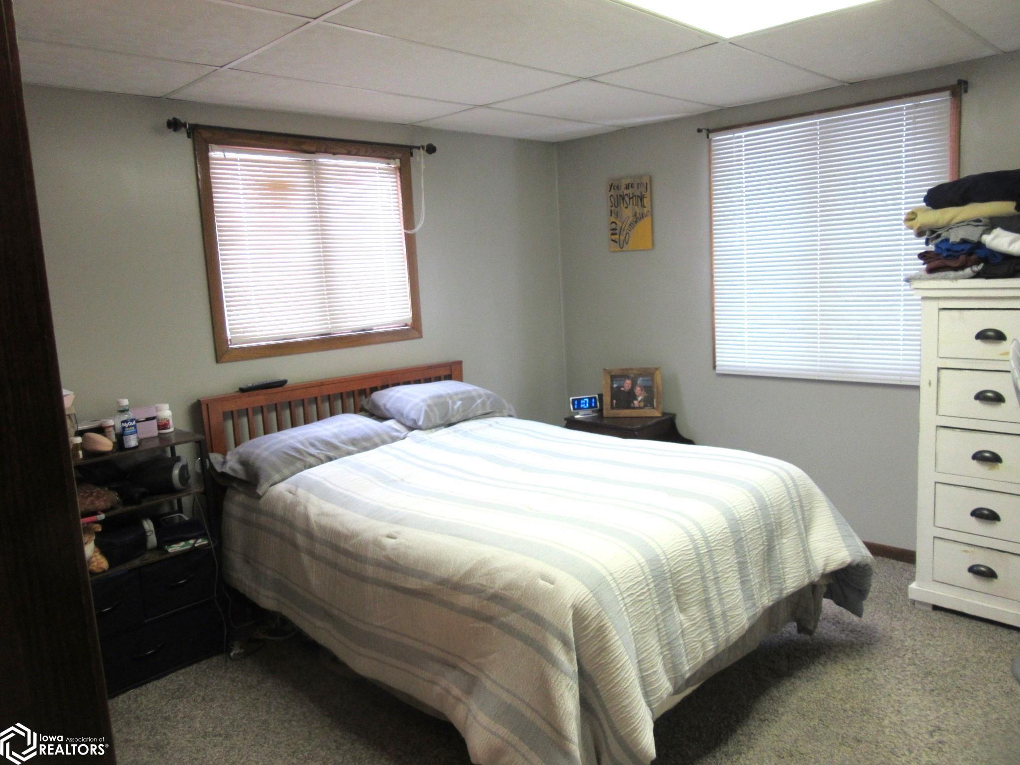Larger of the three bedrooms.   Double Closet and nice windows for natural light. ~
