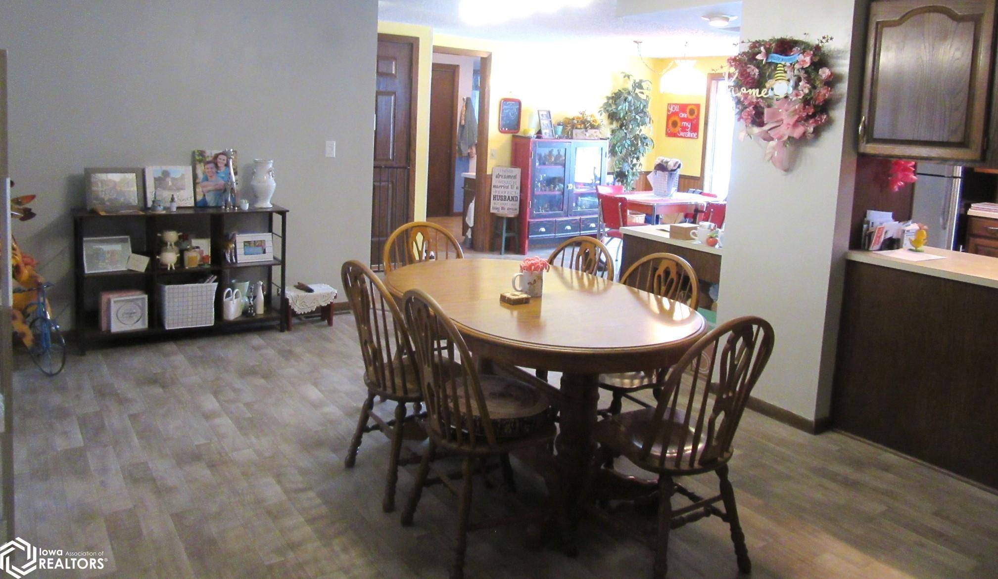Spacious DR with ample space for larger table, chairs, and Hutch.
