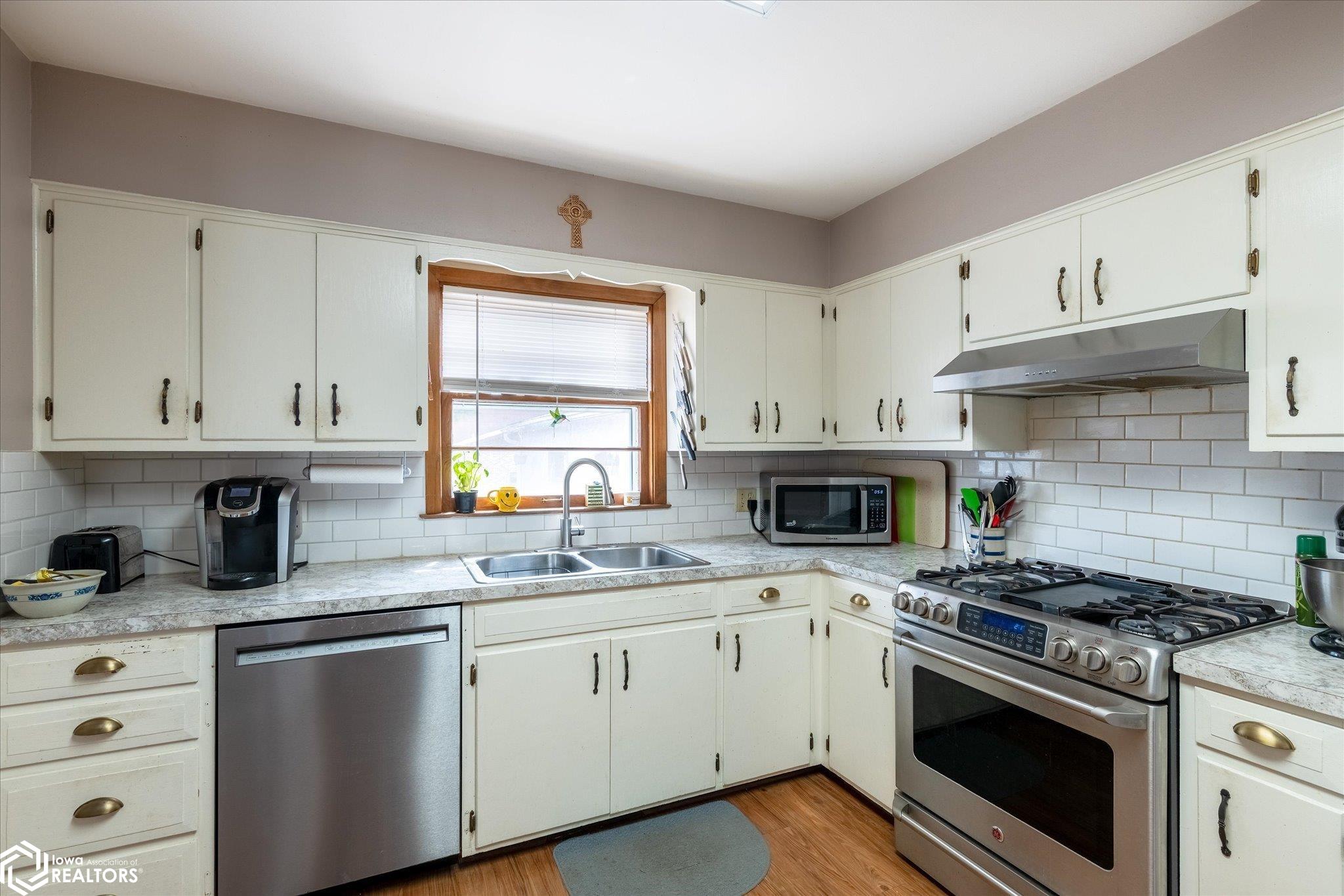 Looking South into the kitchen.