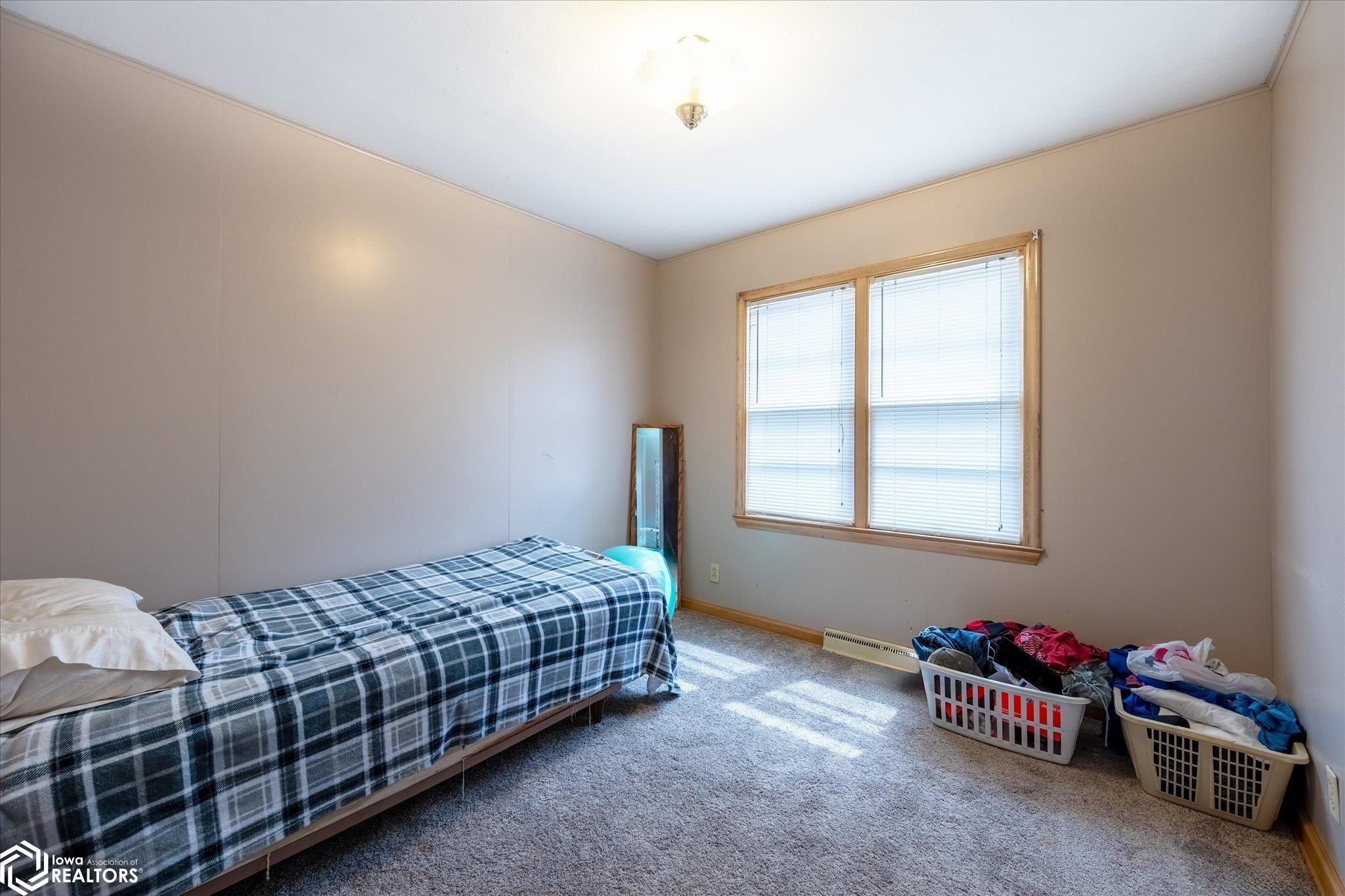 Looking NW into a bedroom.