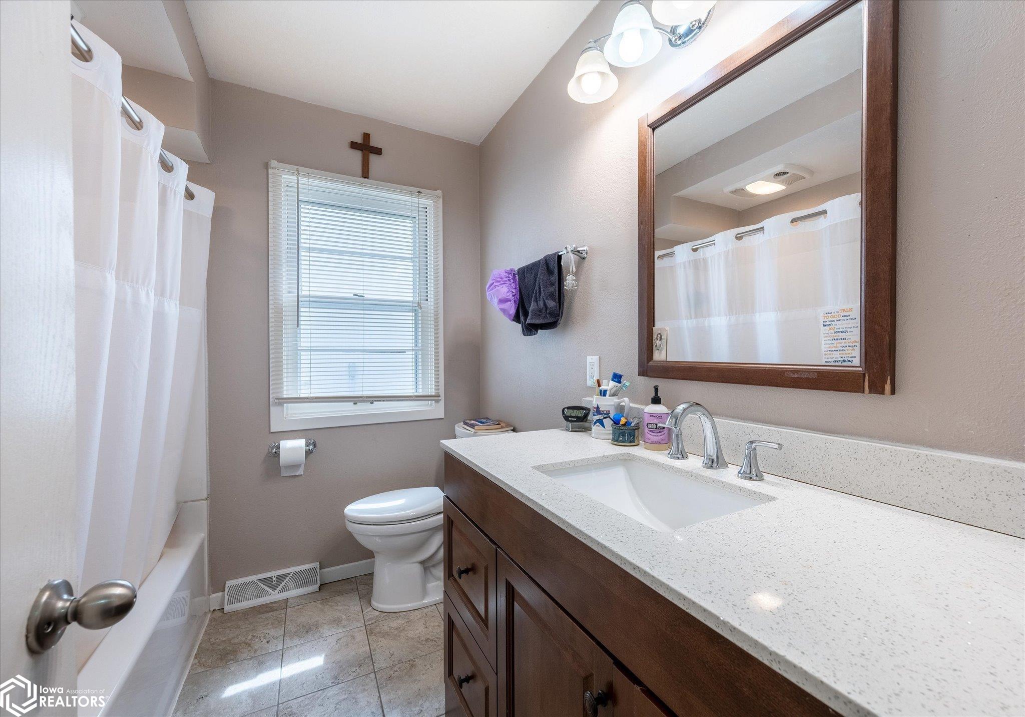 Looking South into main level bathroom.