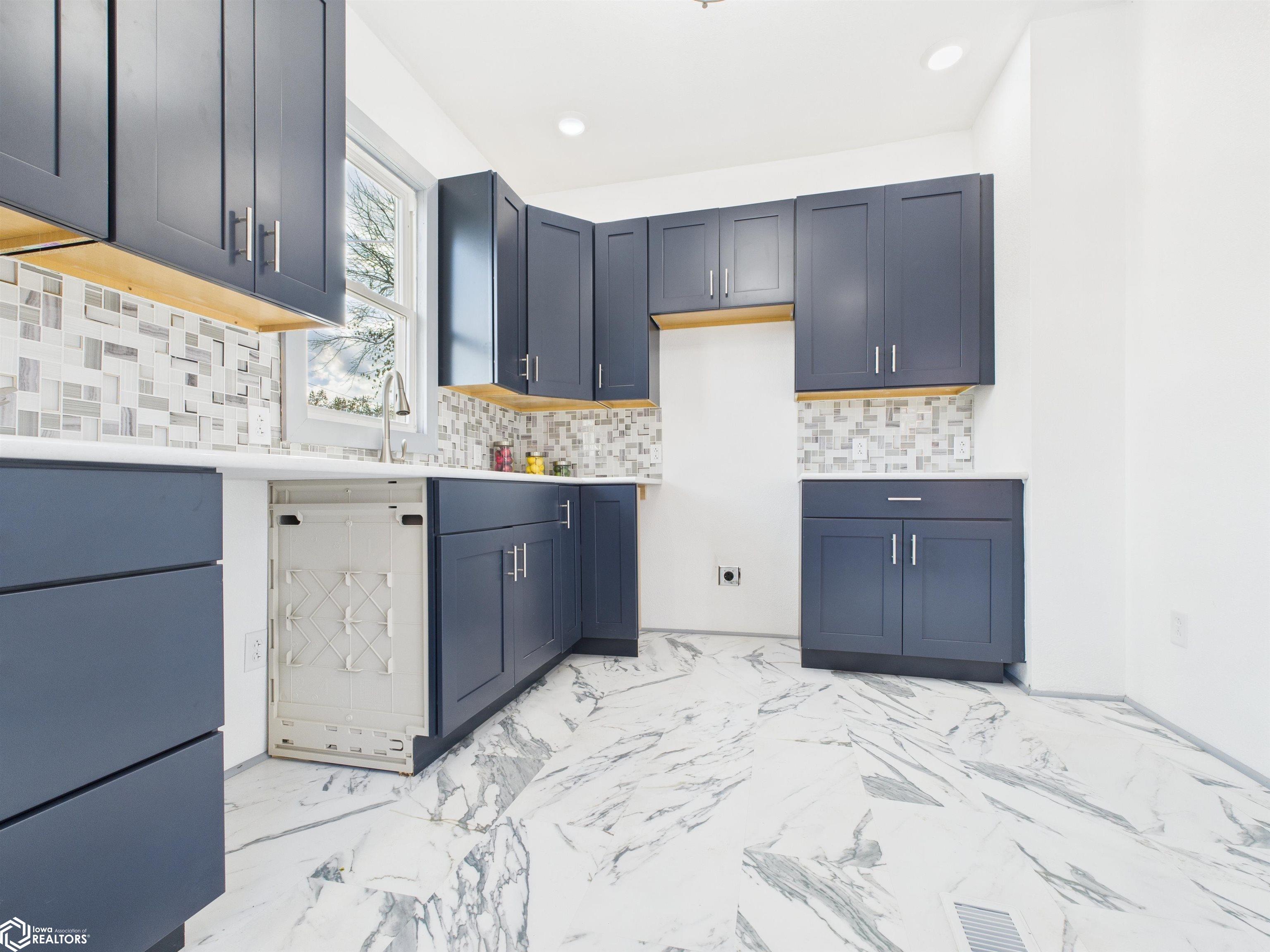 Cabinets are navy