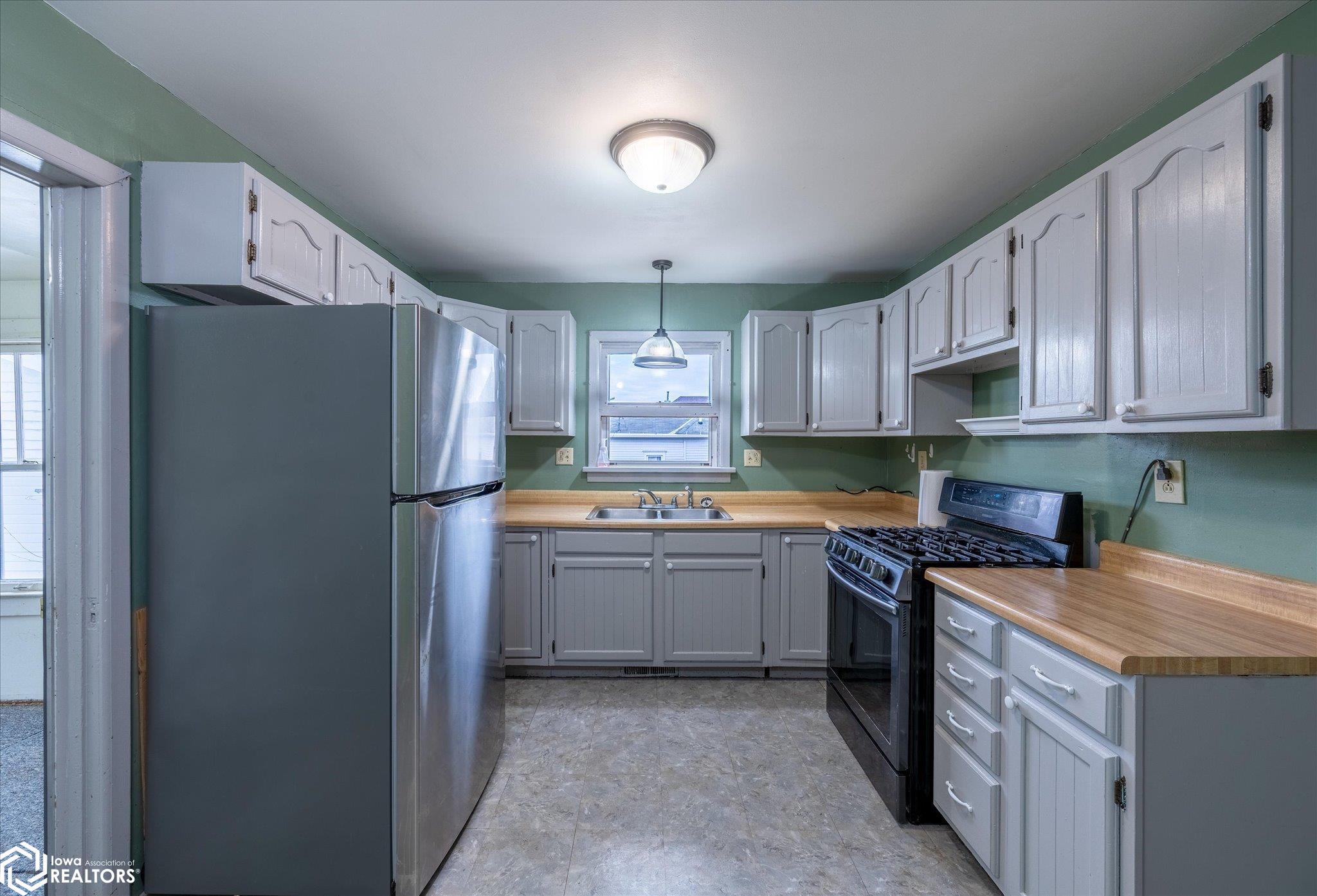 Looking East into the kitchen.
