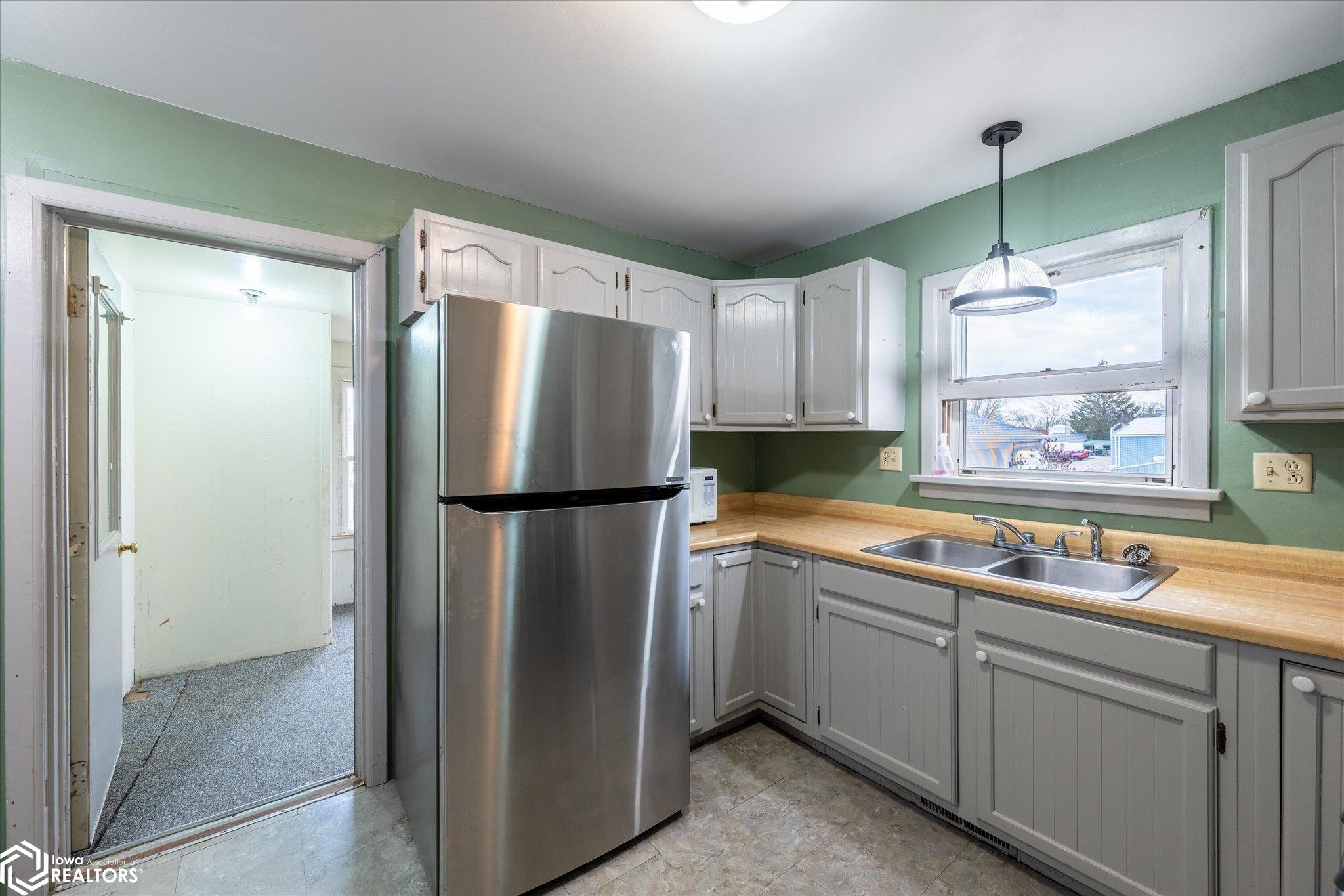 Looking North into the kitchen.