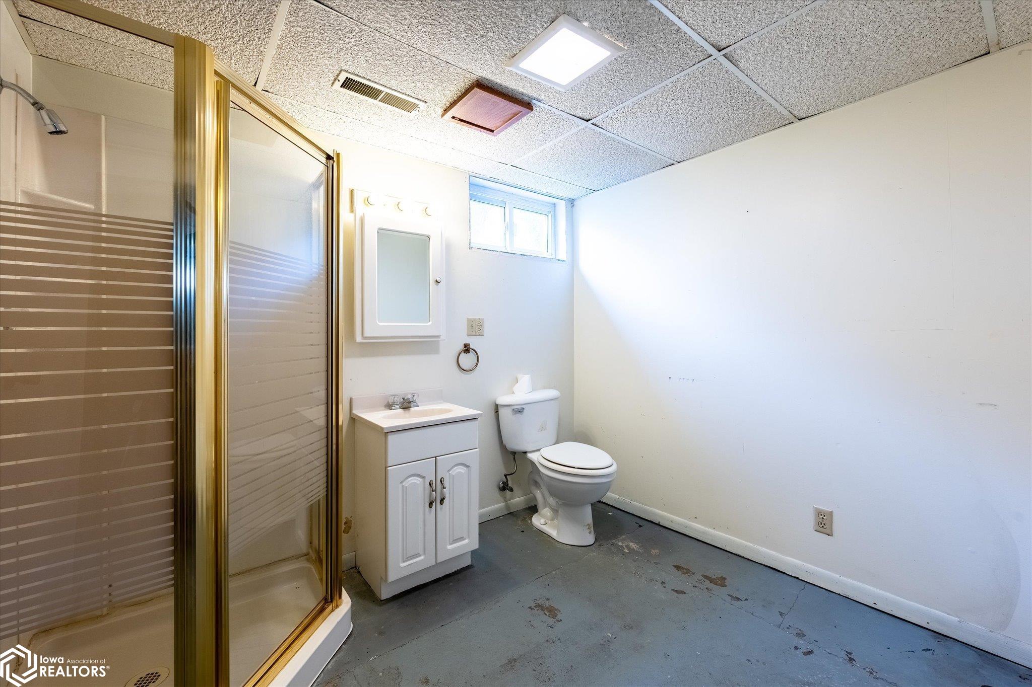 Looking West into the basement bathroom.
