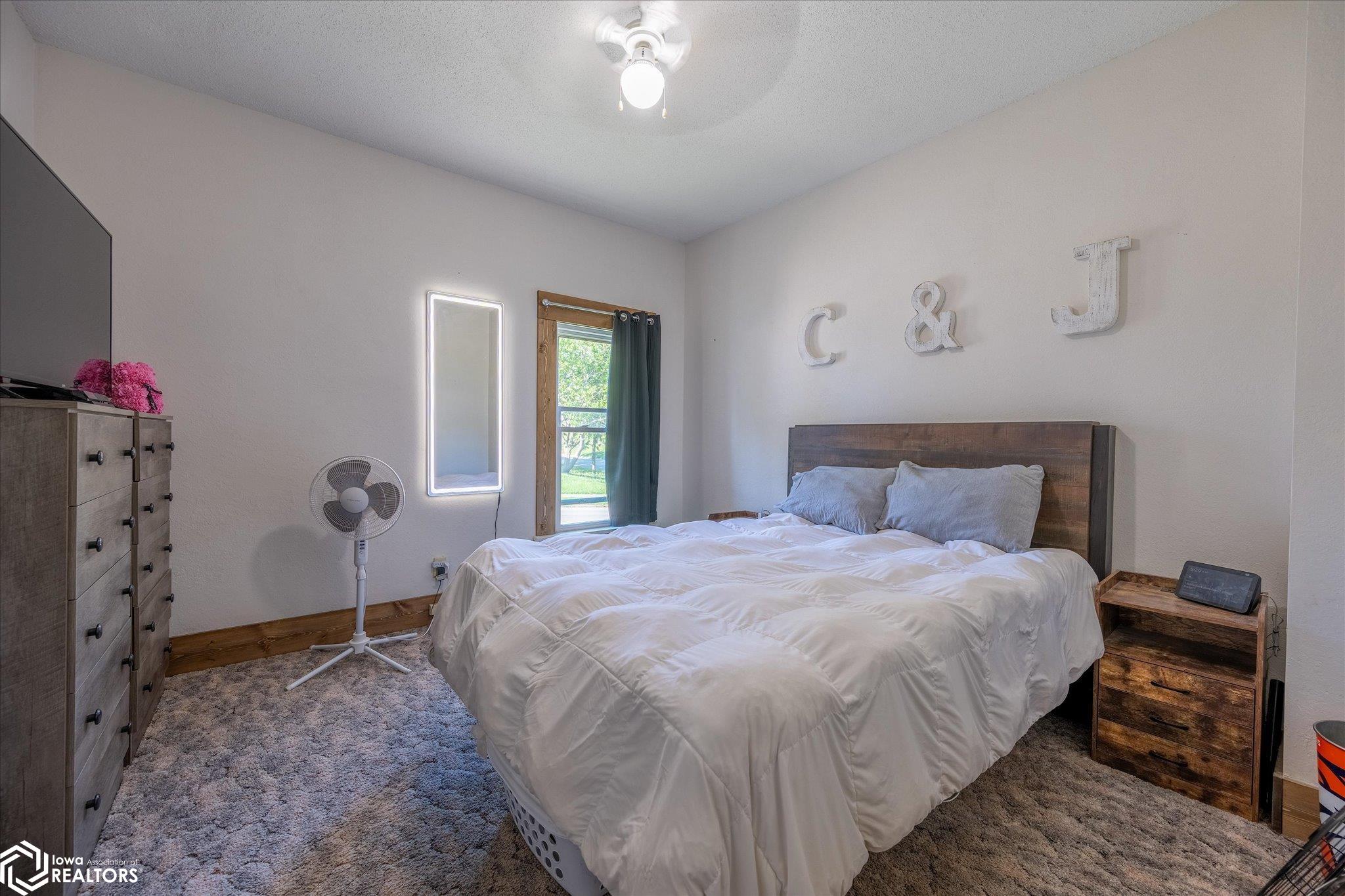 Looking North into the master bedroom on the main floor.