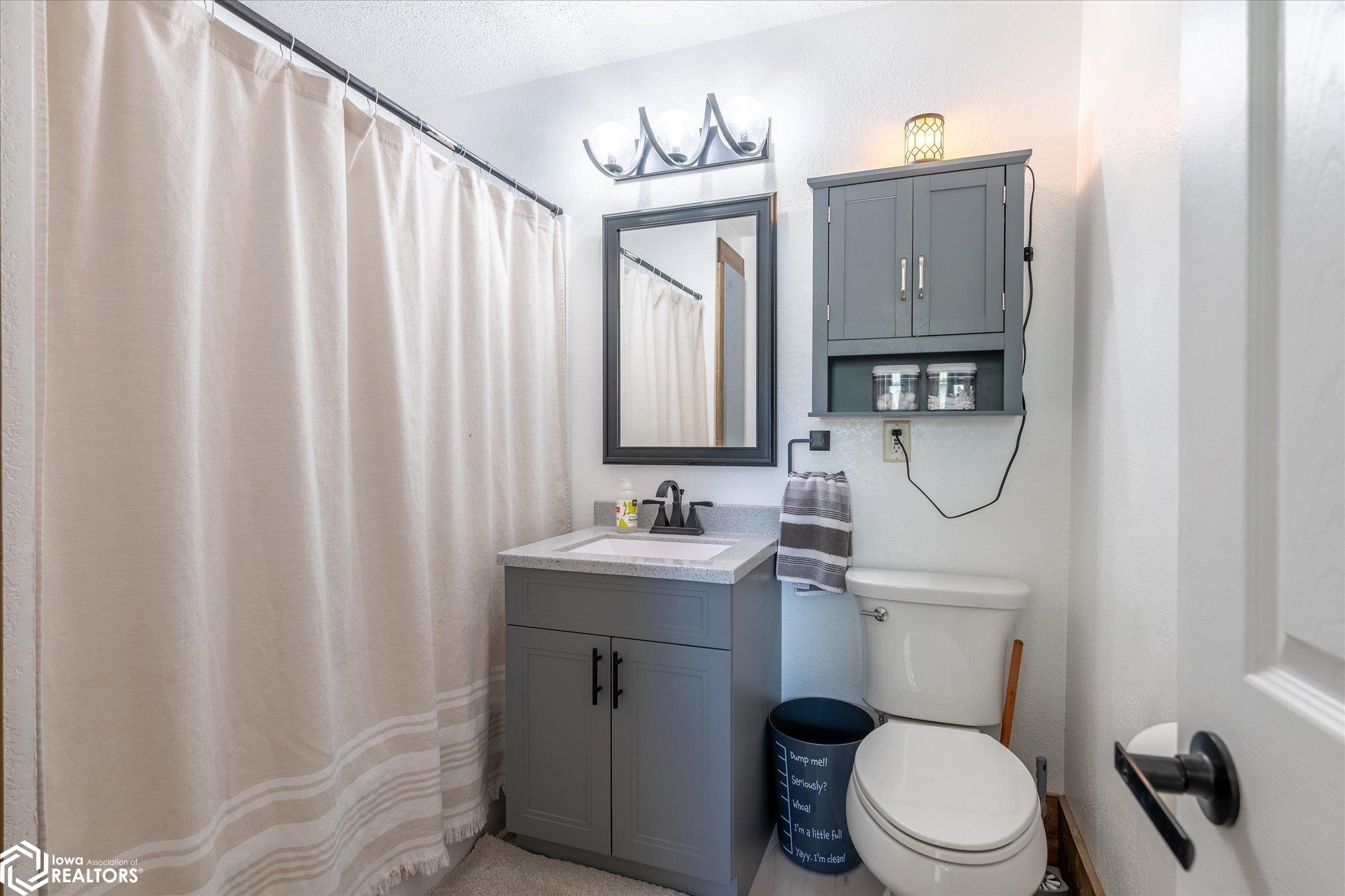 Looking North into the main level bathroom.