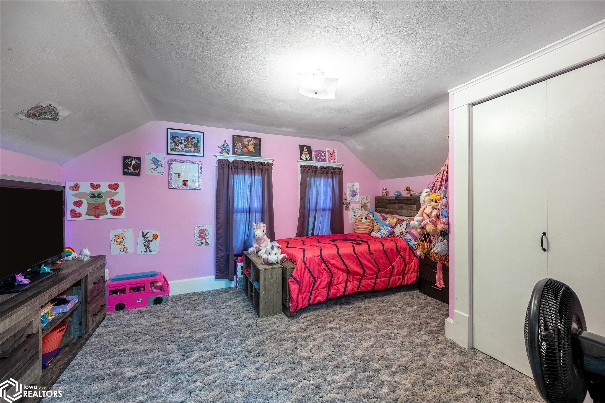 Looking South at the upstairs 2nd bedroom.