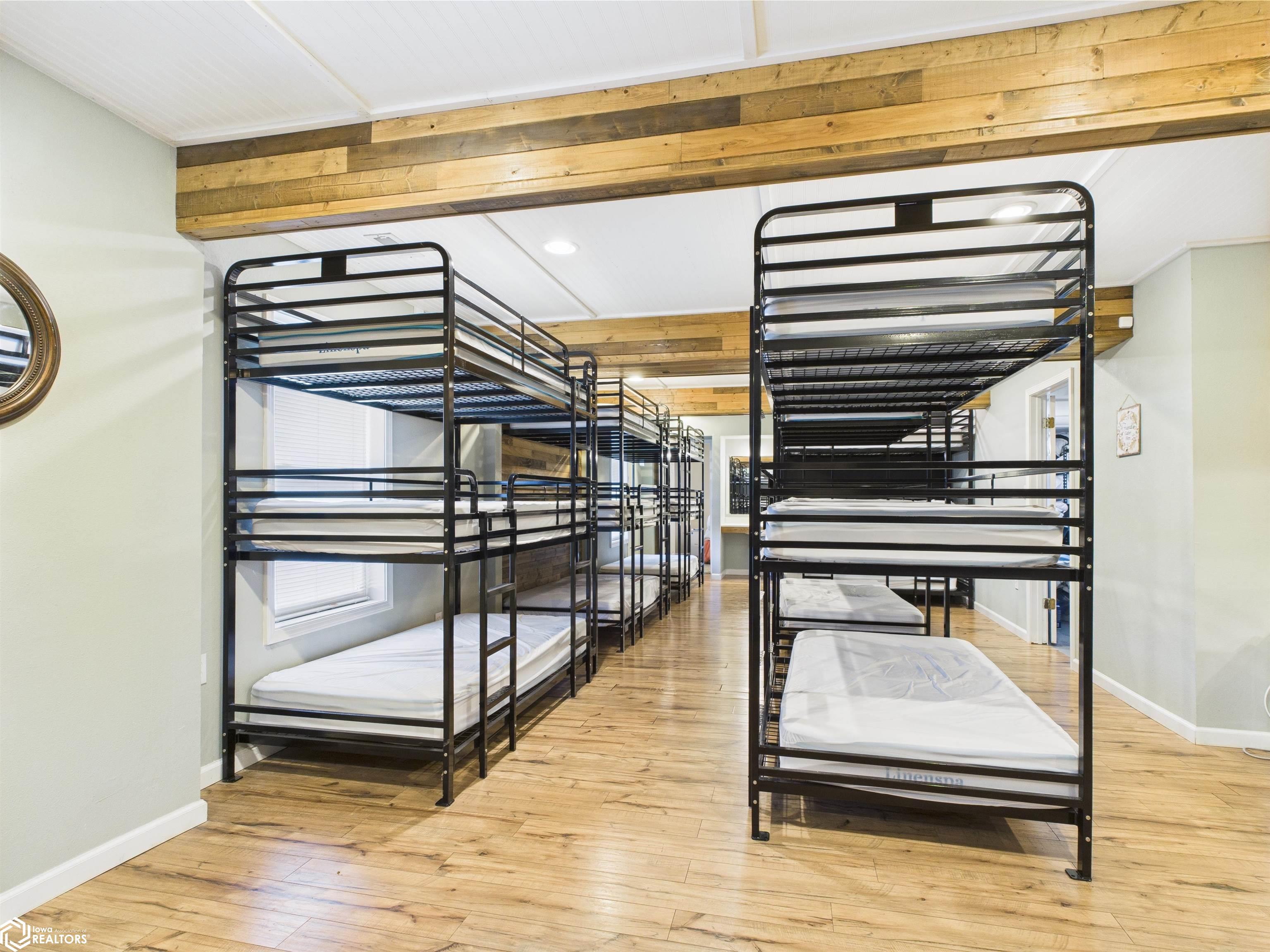 There are 9 triple bunks in this room
