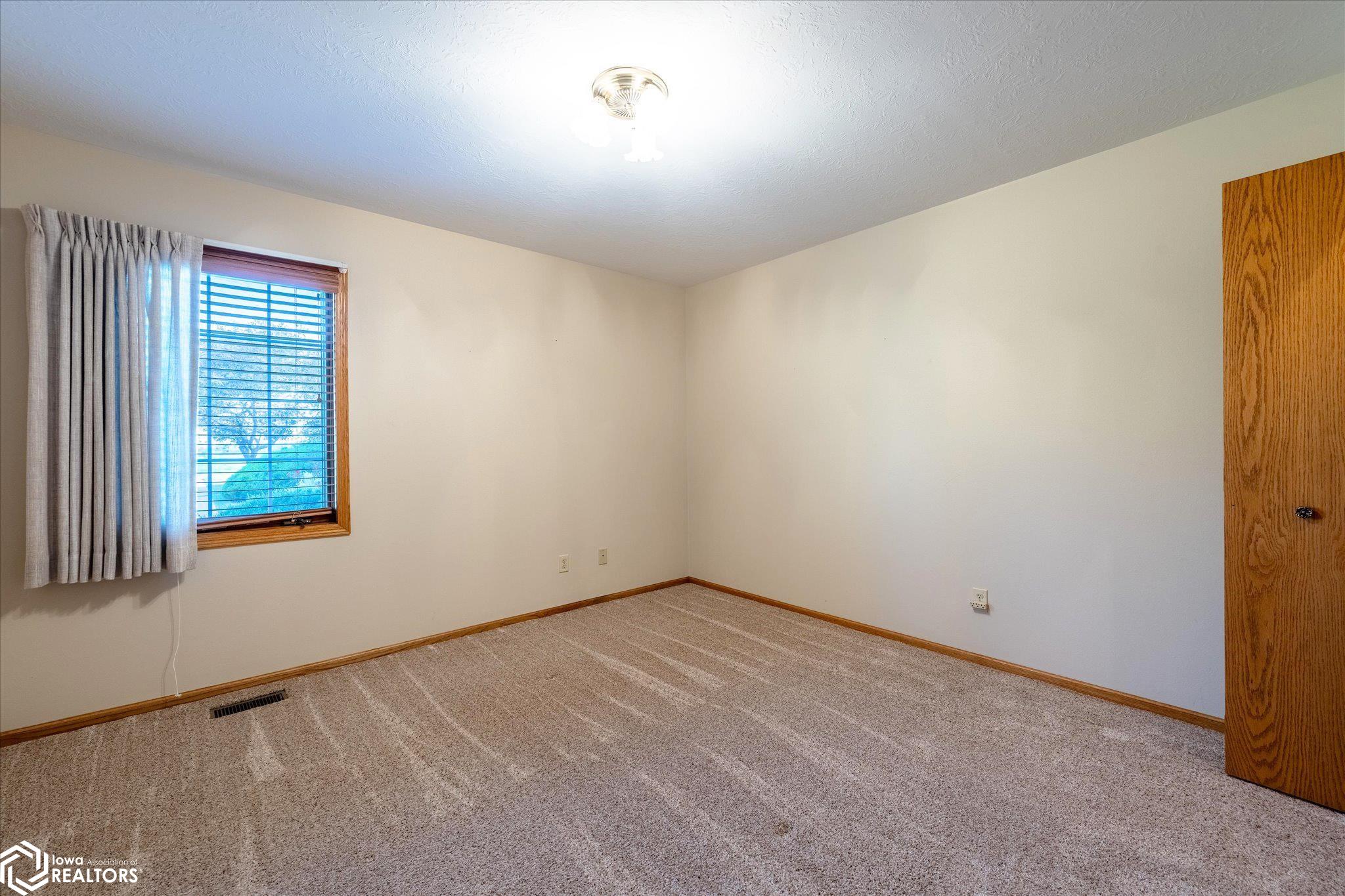 View of the guest bedroom looking SW.