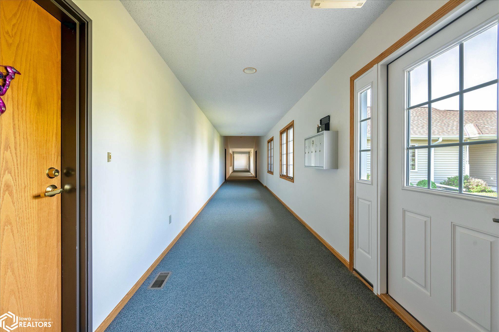 View of the common hallway looking N.
