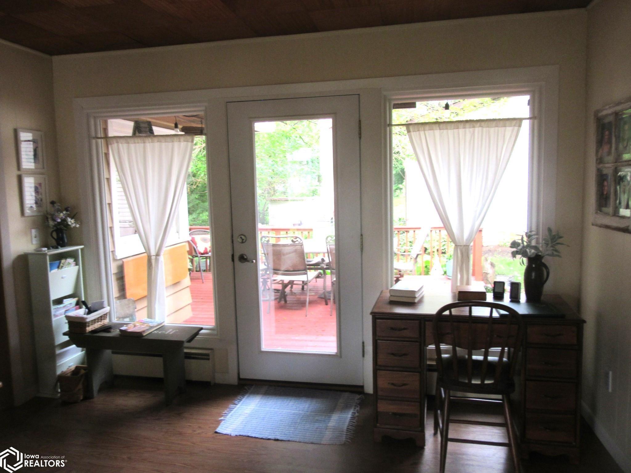 Patio Doors in Sun room  leading to the deck and grilling patio.