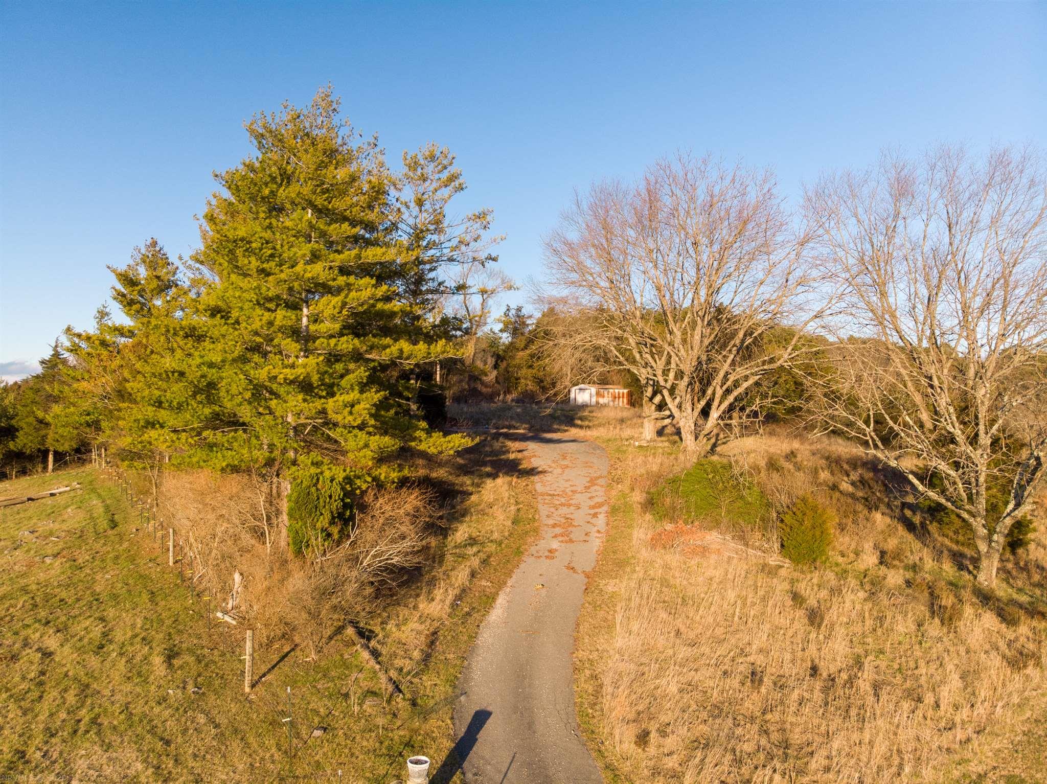 What an investment! Amazing, majestic views await on this peaceful 1.5+ acres overlooking the region with paved driveway. This property is located close to many amenities yet has a rural charm to it. Build your dream home, tiny home or modular on this lovely parcel of land.