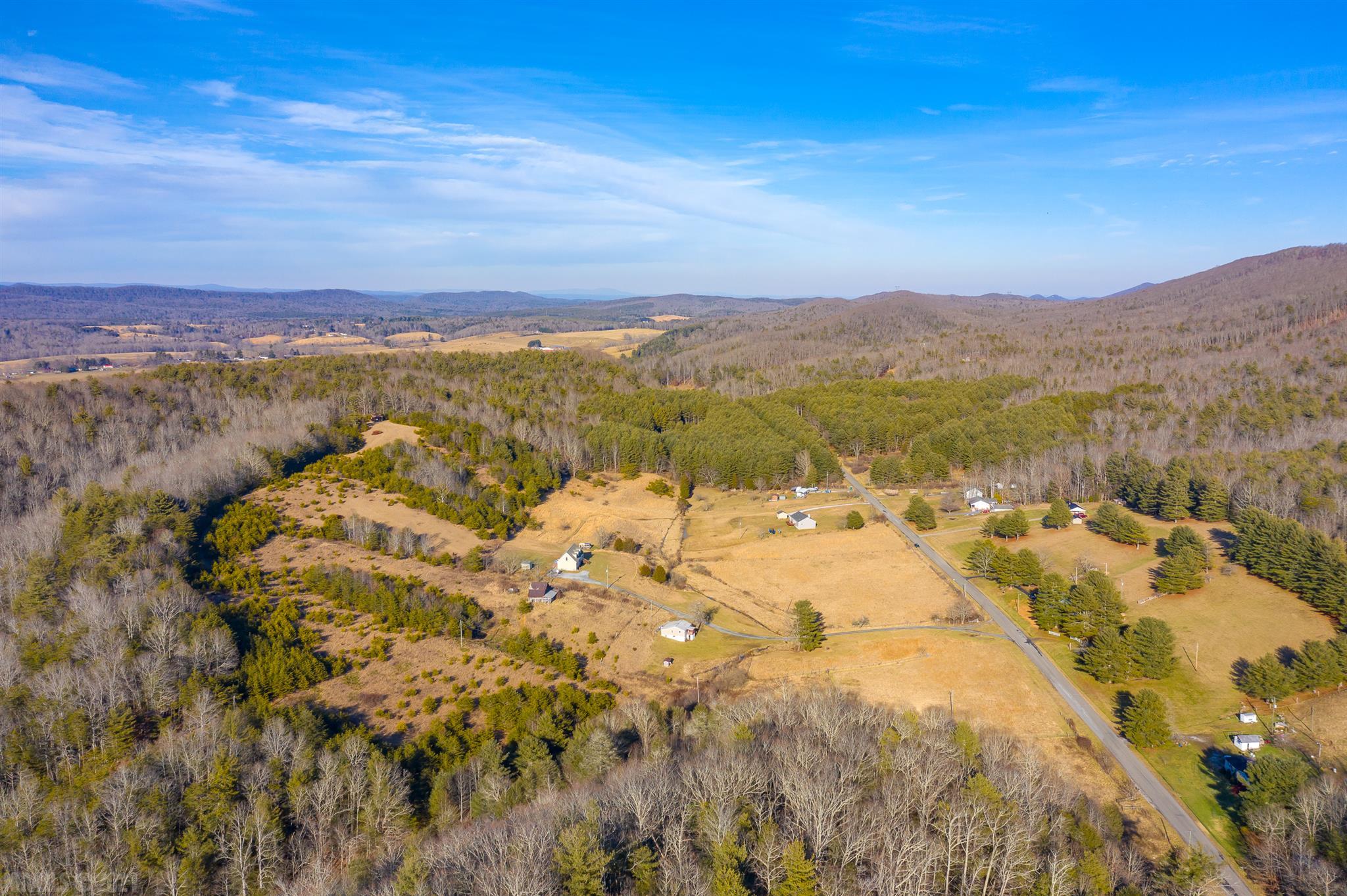 If you are looking for a beautiful property with a mountain view to build your home or for hunting, this is for you. 2 parcels totaling 53.97 acres with paved road frontage in a county setting and only minutes away from town or the interstate.