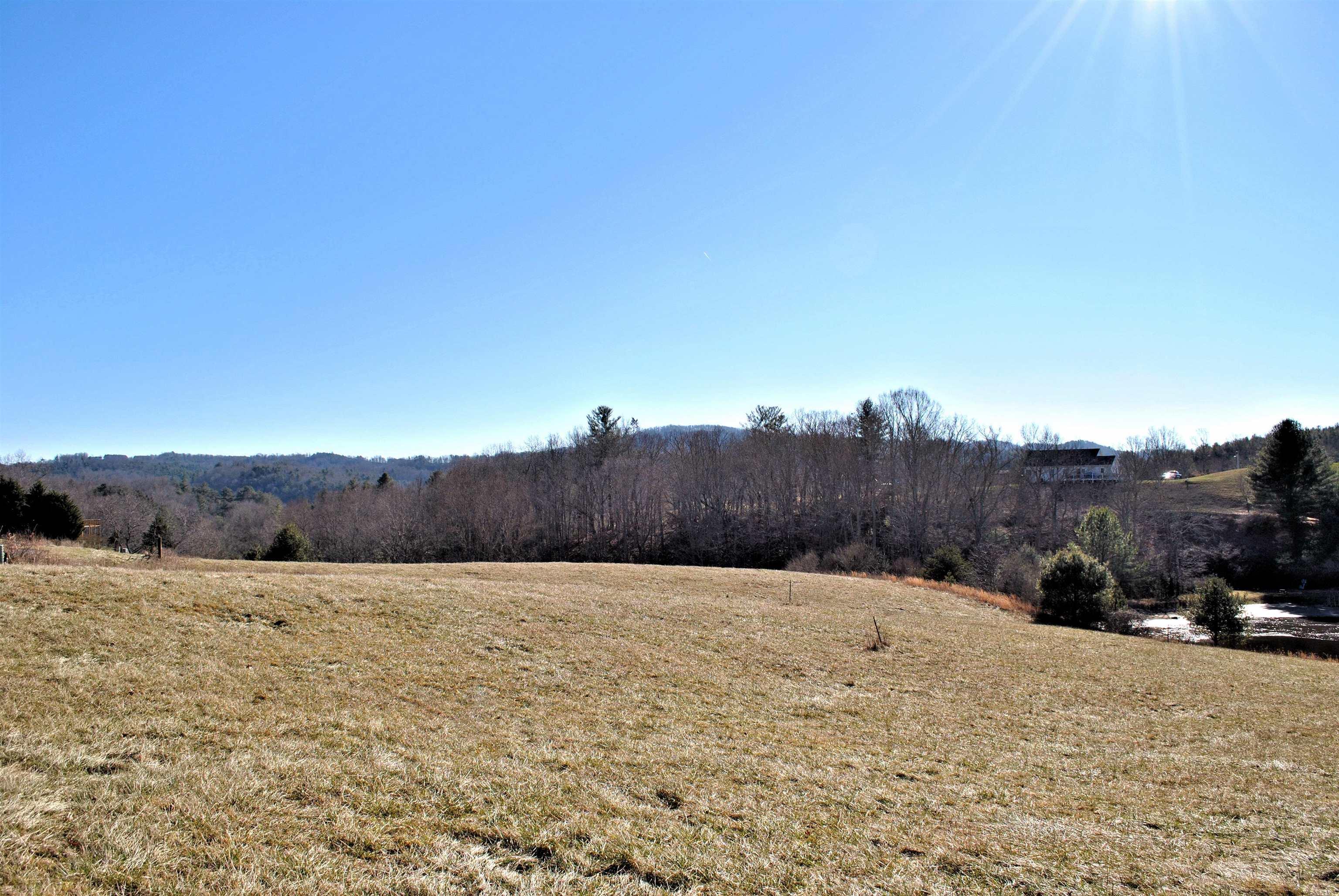 Build your dream on this open lot with great mountain views near the end of a cul-de-sac with pond frontage!  Property has High Speed Internet available with Fiber Optic Cable at the property so you can work from home!  The property has perk test completed for a 3 bedroom home.  Conveniently located within 15 to 20 minutes to I-81, Christiansburg, Blacksburg, VT, Radford, RU, Carilion Hospital, Montgomery Regional Hospital, etc... Country living at is finest!  Call for a private showing!