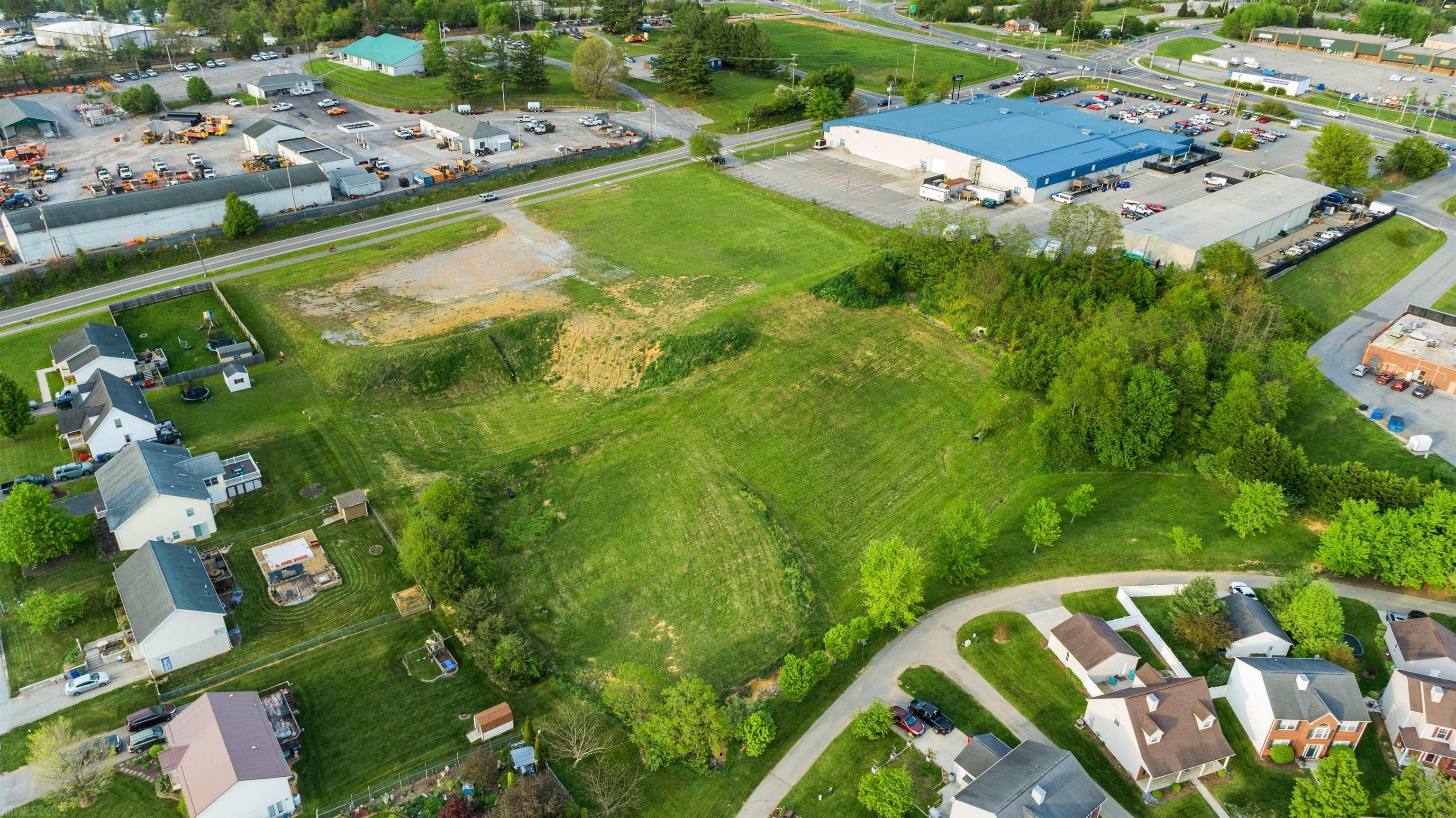 This 2.3+ acre Commercial lot is located in Christiansburg on Cambria Street, directly behind the Christiansburg Recreation Center with direct access to the Huckleberry Trail.  Great location with high visibility and high traffic count.  Easy access from 460 Business and I-81.  This property is zoned B3/General Business with many uses available. (Church, restaurant, retail, repair/service facility, storage buildings, athletic facility, professional offices, etc.) Additional 2.5-acre tract also available direct beside this lot.  MLS#