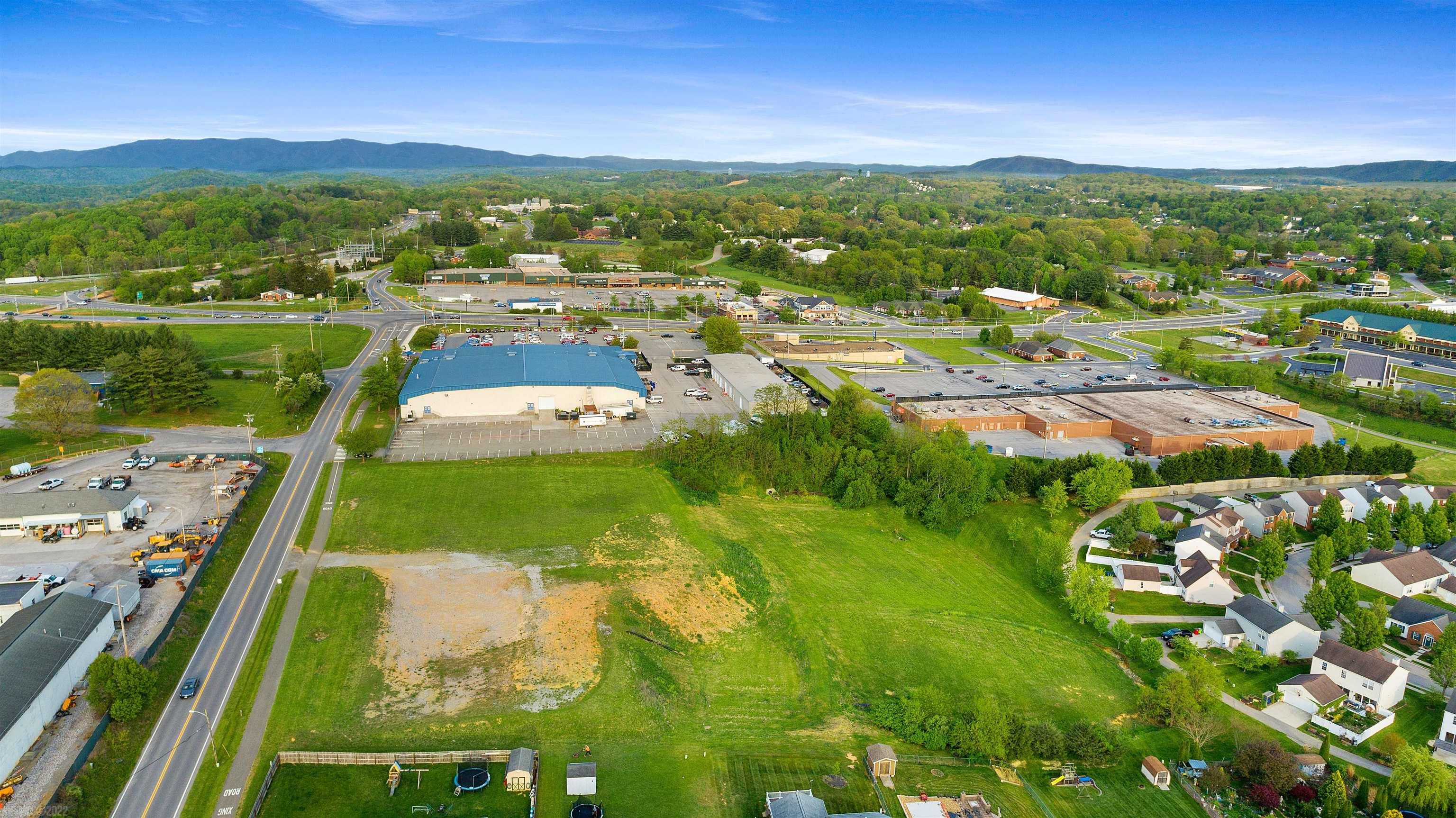 This 2.5+ acre Commercial lot is located in Christiansburg on Cambria Street, directly behind the Christiansburg Recreation Center with direct access to the Huckleberry Trail.  Great location with high visibility and high traffic count.  Easy access from 460 Business and I-81.  This property is zoned B3/General Business with many uses available. (Church, restaurant, retail, repair/service facility, storage buildings, athletic facility, professional offices, etc.) Additional 2.3 acre tract also available direct beside this lot.  MLS#