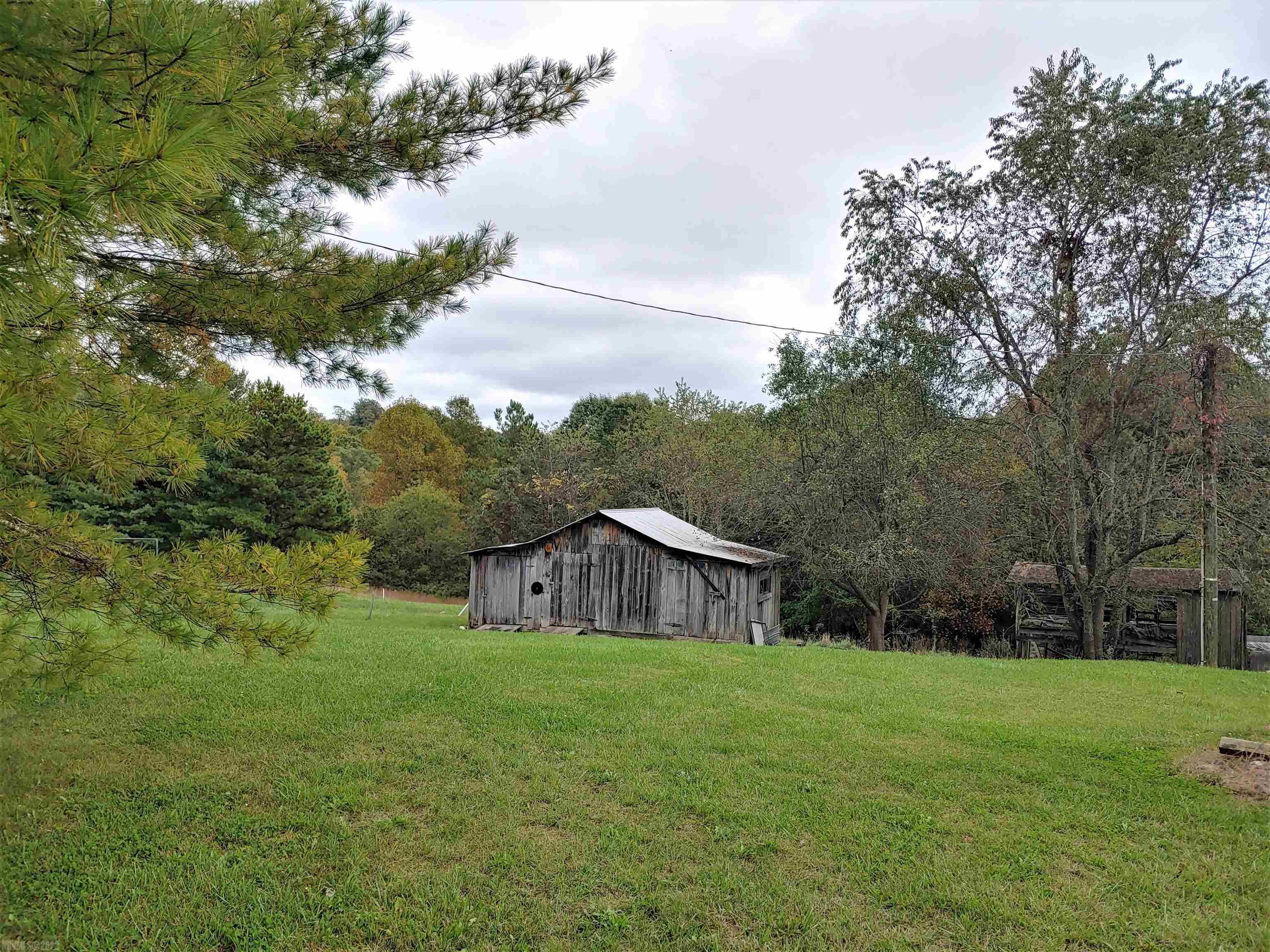 A property that is very ready for you to bring that new home HOME. A very excellent beautiful tract of land with a stream running through it. County Approved septic system already installed. Electric meter base already in place. 15 minutes to Christiansburg.