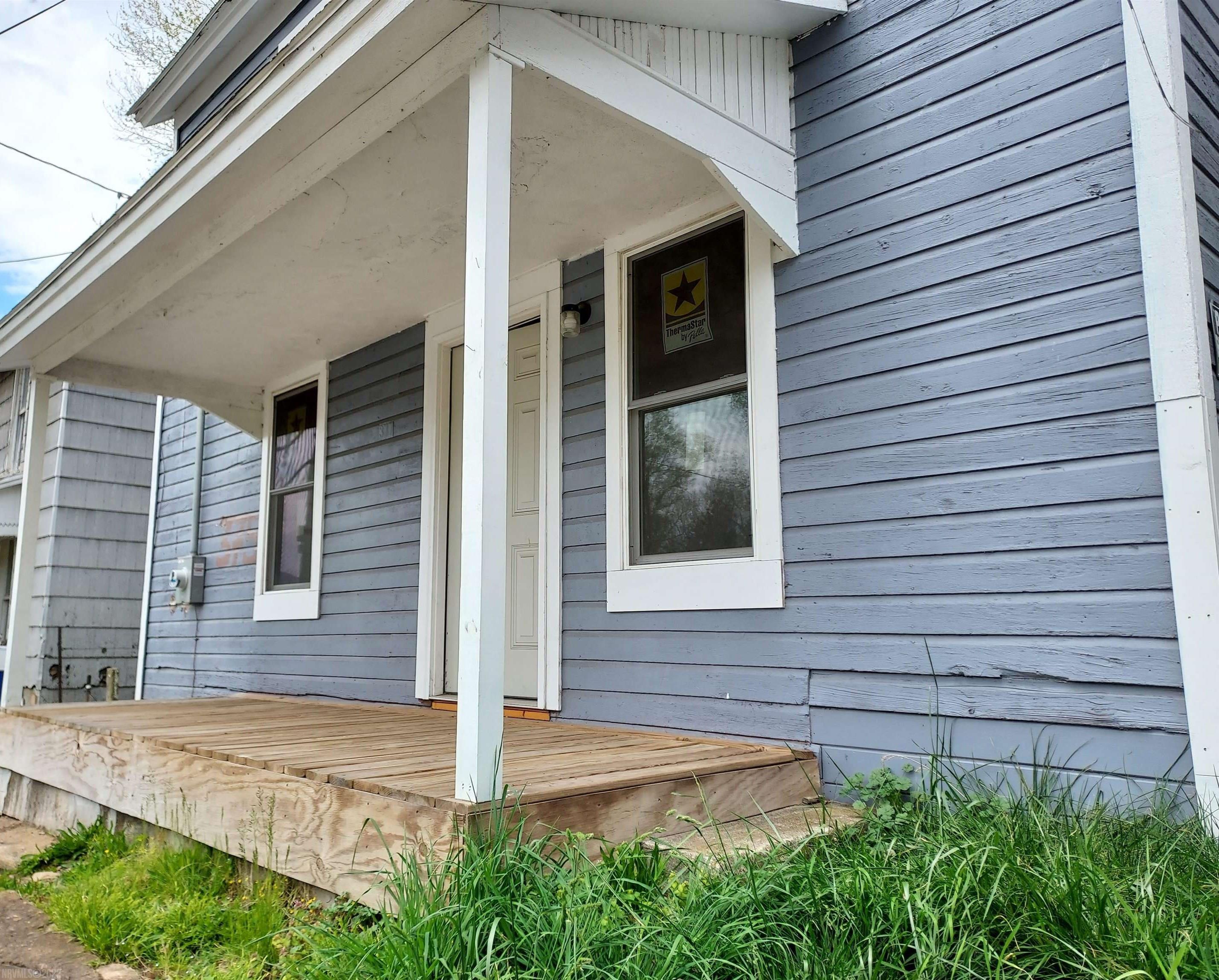 Handyman Special!  This old house has been partially renovated and needs a little extra effort to bring her across the finish line.  Renovations include new electric, new windows, new kitchen & bath, new flooring and new washer/dryer hookup.