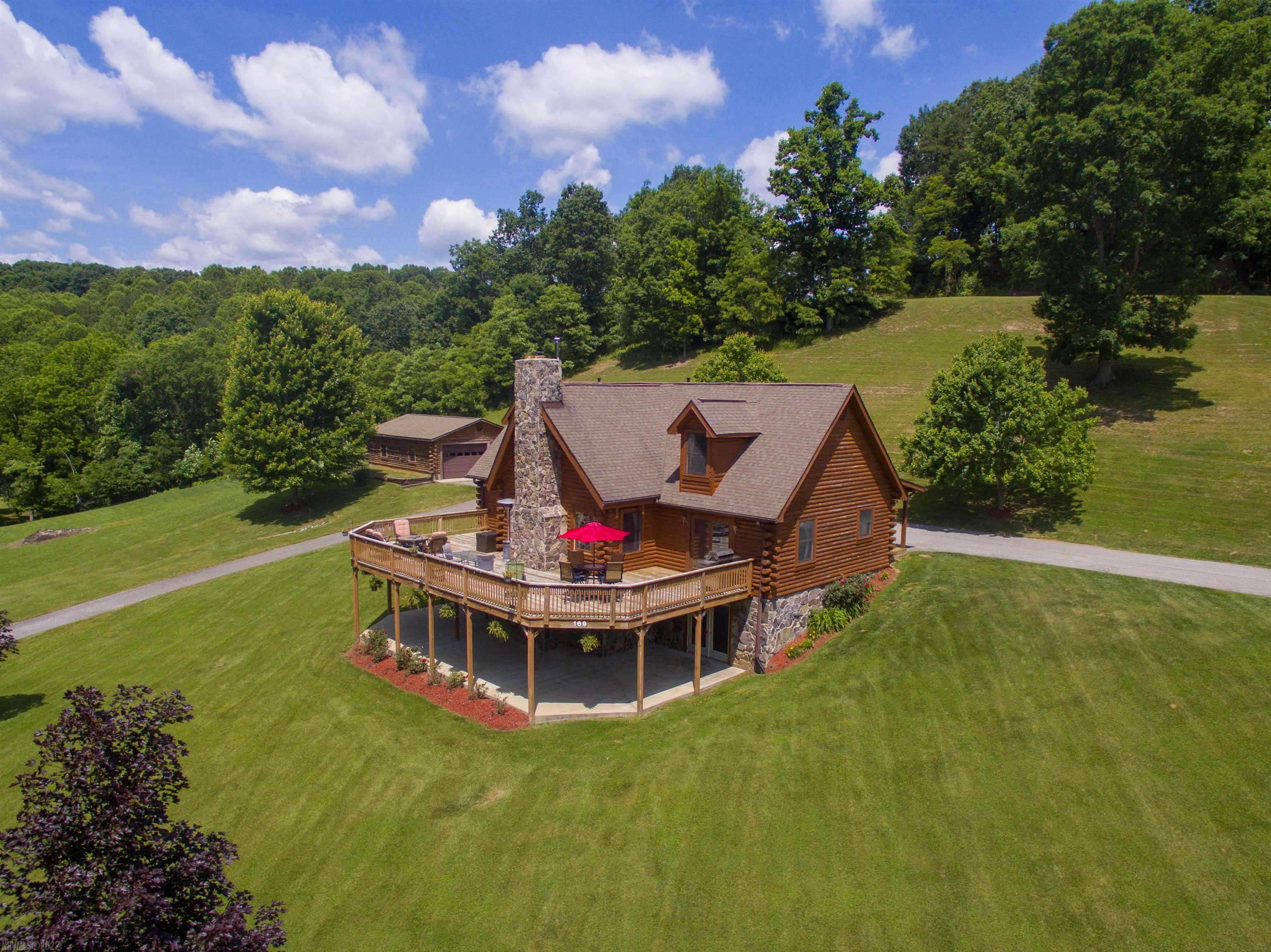 Looking for a great location in a private neighborhood about 5 mins from Downtown Wytheville??? Look no further than this beautiful log home sitting on 3 acres just on the outskirts of town. The house is a 3 bedroom, 2.5 baths and approximately 3250sqft with additional square footage that could be finished out to potentially add an additional bedroom and bath. The home boasts a large eat-in kitchen that leads into a large living room that displays a beautiful stone fireplace acting as a centerpiece for the whole home. The master bedroom is located on the first floor and has a large master bath and walk-in closet. Feel free to cook out with friends & family on the huge deck that extends the living space outdoors or gather around the fire pit taking in the stars and enjoying the country air only minutes outside of town!!! This property is in a very desirable private neighborhood and it’s not going to last long!! So schedule your showing today!!