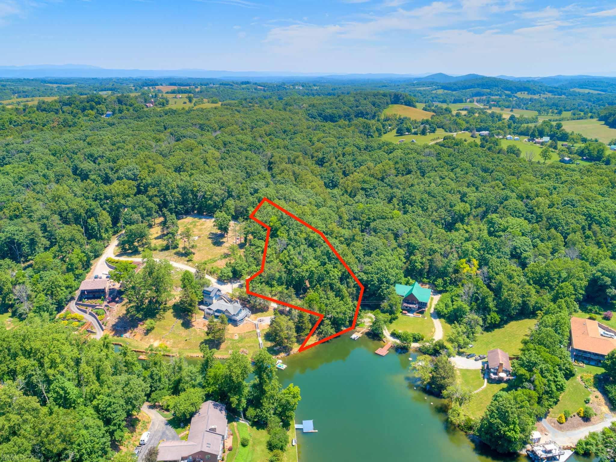 Beautiful WATERFRONT lot with 130' water frontage on Claytor Lake!  Everything is in place for you to build your dream home in this nice neighborhood located in a wide cove close to Claytor Lake State Park.  Easy to get to, this lot is only 5 minutes from I-81 exit 101, so all the amenities are just a close drive away!  Dining, medical, etc. close by!  Please see attached documents for dock drawings, survey, etc.
