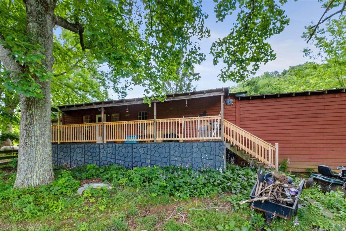 This 2 bedroom, 1 bath ranch-cabin sits perched on a hill on 39 acres in Floyd County.  Beautiful views, fencing for horse and cattle with pond.  Home needs some TLC.