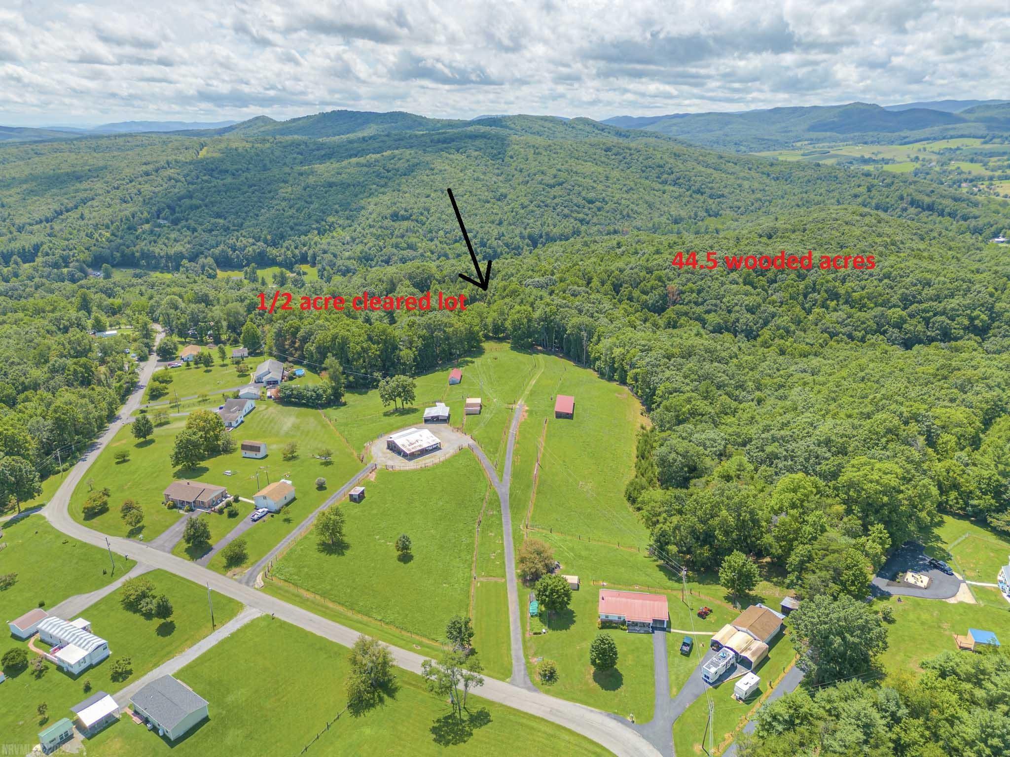 Looking to build your perfect home in a private setting?  Look no further! This property is made up of 2 tracts making up 45.27 acres that is accessed on Shrader Rd (deeded easement) and also borders Robinson Tract Rd.  A flat area (approx 1/2 acre) is already cleared to build your dream home! If a more secluded homesite is what you are looking for, pick a nice spot on the remaining 44.5 acres! The possibilities are endless!  Call a realtor today to walk with you through the many trails on the land.  Great area for your personal recreation including hiking, hunting and putting in ATV trails. Public water located on Shrader Hill Rd. There is a utility easement on the front of the property that borders Robinson Tract Rd. Check out the public documents for surveys and aerial GIS plat.