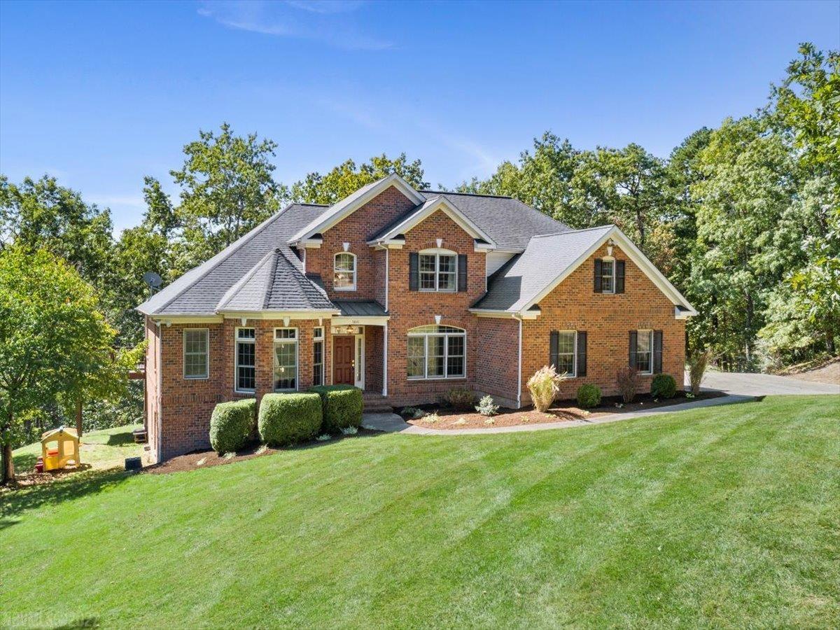 Beautiful, all-brick home on over 4 acres in Brush Mt Estates with gorgeous Fall/Winter views of Blacksburg and Lane Stadium!  With over 5000 square feet, 5 bedrooms including a master and guest bedroom on the main, soaring ceilings and a large covered deck, this home is perfect for entertaining! The main floor also has hardwoods throughout, a nicely updated kitchen and tons of natural light.  There are 2 bedrooms upstairs along with a bonus room, perfect for a playroom.  The walkout basement features another bedroom, full bathroom, game room, flex room that would make a great space for a home gym and a conditioned workshop.  This home has so much to offer, make your appointment today!