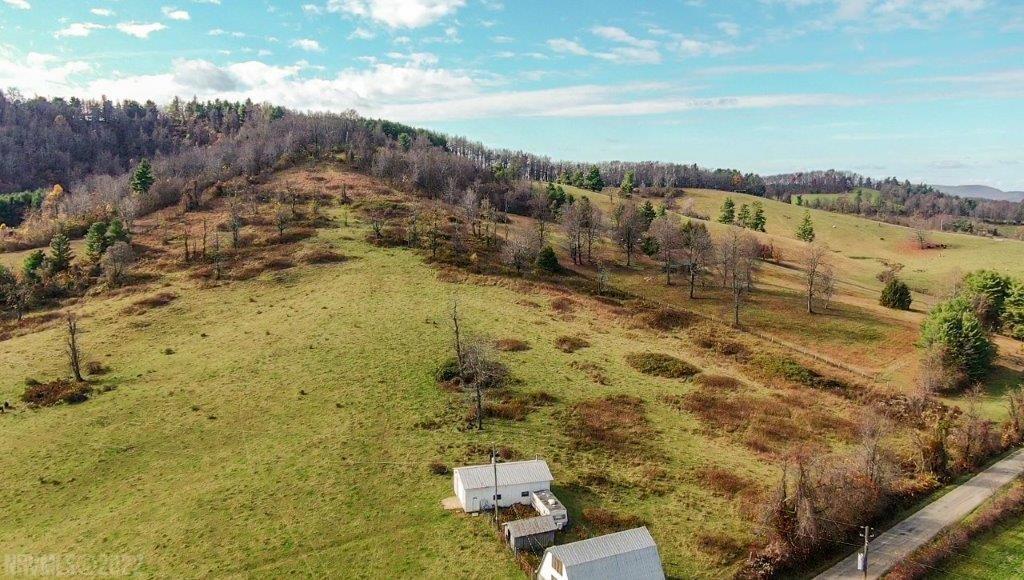 Online Auction ending December 15th at 3 PM. THIS OFFERING IS KNOWN AS OFFERING 2. This offering consists of 12.915 acres. Mostly open with some wooded acreage on Fairview Church Rd. Has an old barn and large building on the property. Multiple home sites with great long range views. Hydrant located on this property and is supplied with water from spring on Offering 1. An easement will be recorded at closing.