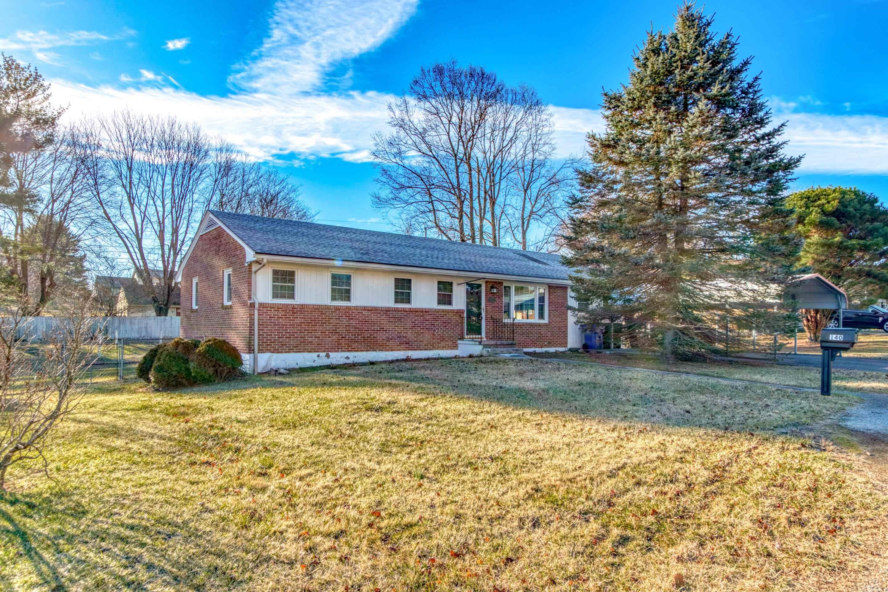 Beautiful, well maintained brick ranch located in a great neighborhood close to downtown Christiansburg! This home is in move in ready condition and has plenty of space on the main level with 3 bedrooms, 1 bathroom, kitchen, and recently repainted living room. Also boasts a nice sized bonus room off the kitchen that leads out to a screened in porch that connects to large deck area with a porch swing overlooking a large fenced in back yard. Potential garden space in the back yard along with a storage building with electricity. The finished basement has a tremendous rec room space or second living room potential along with a possible 4th bedroom and an additional bathroom. Other features include newer kitchen appliances all replaced since 2018 and new windows installed throughout the house in the past couple years! Come check it out today!!