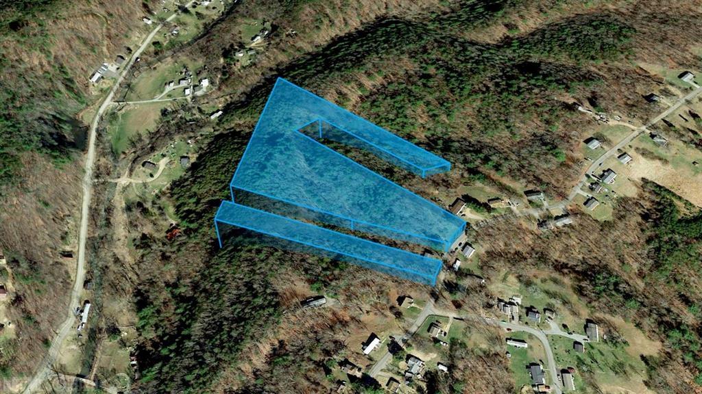 2 huge lots include 9 total acres, near the city with incredible views!  With both lots zoned for Low Density Residential (LR), there are so many options! Use one lot for homesteading and the other to build a duplex, manufactured home rental, or add passive income by renting out the land to the telecommunications companies. Has paved road access and the larger lot of 7 acres has a driveway.