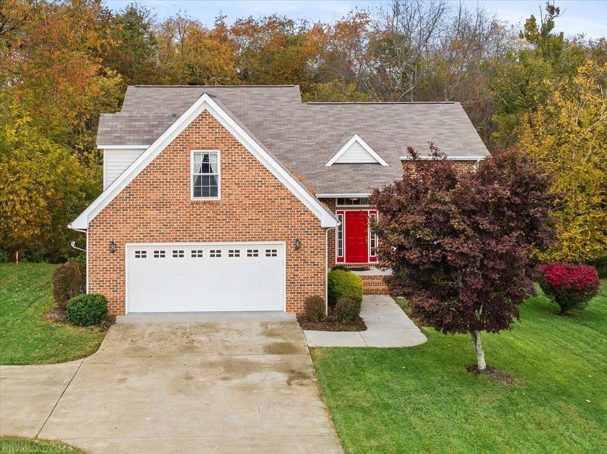 Beautiful 4 bedroom home with a walk-out basement on a large, quiet and private lot in Heron's Landing. Inside you will be greeted by soaring ceilings, tons of natural light and gleaming hardwood floors. Enjoy Gorgeous views all year round through giant windows! The main level features an open floor plan, bright kitchen that walks out to the deck, a spacious master bedroom with large en suite bathroom and walk-in closet, and the laundry. Upstairs has 3 more bedrooms as well as a loft space. The basement is an excellent entertaining / living space with a full bath and a mini bar, full of light and walks out to a covered screen porch. The basement also has a third garage, perfect for your golf cart! The home has been meticulously maintained with many recent updates. Neighborhood amenities include world class Pete Dye golf on the New River, a community pool, excellent restaurants, a brewery and even a distillery all within walking distance.
