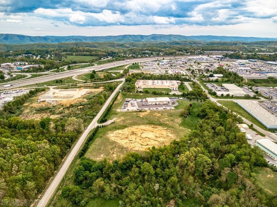 6.4 acre lot available in the highly desirable Christiansburg Industrial Park.  Excellent proximity to Interstate 81 at Exit 118 C.  Level with 125' of road frontage on Industrial Drive and an additional entrance available on Houchins Rd with 943' of frontage.  Entrance is already cut in to the lot on both streets.  30' easement for ingress/egress for Parcel 2.  Zoning is Industrial General and offers a multitude of available uses.  This parcel is along the 460 corridor in Christiansburg and just minutes from Blacksburg.  Pad ready with little excavation needed.  All utilities available.  Industrial Drive is a heavy traffic area and this lot has excellent visibility.  Christiansburg Industrial Park entrance has a daily traffic count of 26,000+.