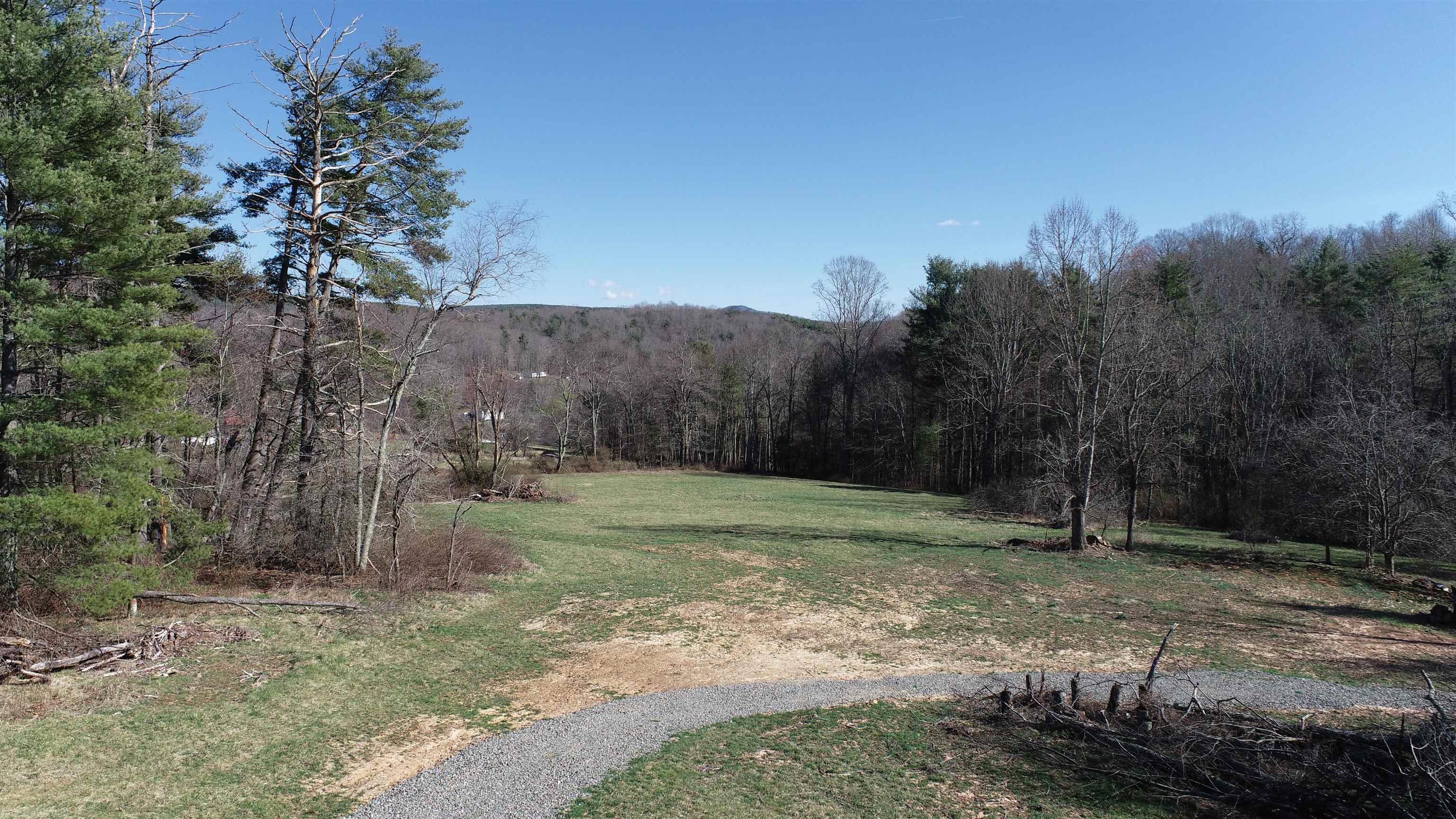 Beautifully secluded property with Mountain Views and loads of potential on this unrestricted 13 plus acres!!! A must see for your future home site. Two sites perked for a 3 bedroom that carries over to new owners and can be used on additional spots of the property though one spot is marked. Property offers a 1000 ft of stream and mostly flat useable ground. This land had been surveyed, cleared, and a road has been put in place so most of the hard work has been done.
