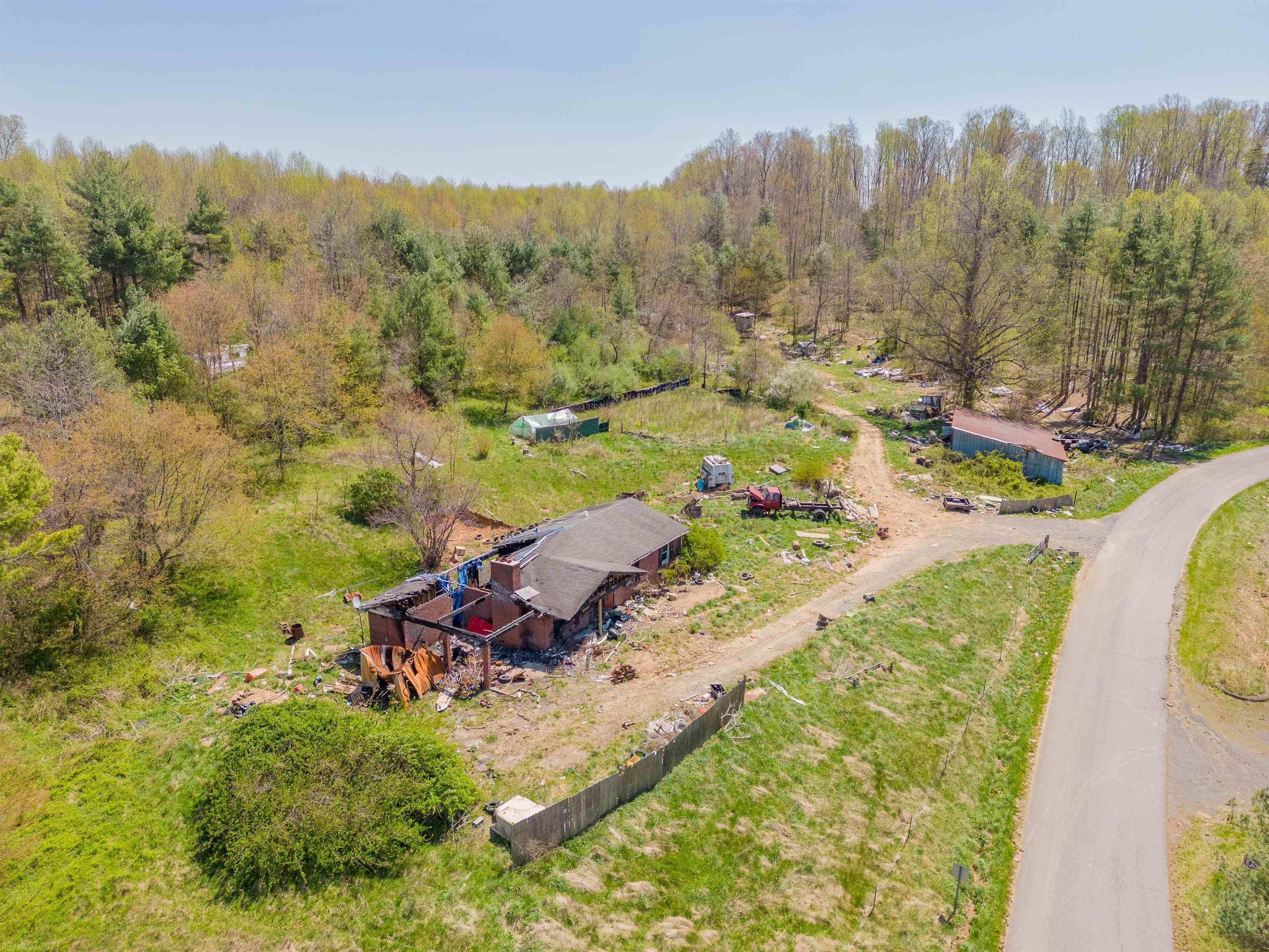 Land with Potential! 7.615 acres of unrestricted land right outside the town of Hillsville, Va. Approximately 0.7 miles from Exit 14 of I-77. This property has approximately 1,400 feet of total road frontage with nearly 370 feet on HWY-58. Commercial restaurants, businesses, and industrial buildings are within a mile radius. There is a destroyed structure on the property with a well and septic. The location and topography of this property allow for many opportunities. Call today!
