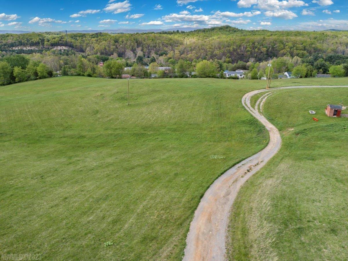 Here is your Chance to own a Beautiful 6 Acre + or - Building Lot in the Auburn School District. The Land Lays Great and has access to Public water from PSA. Come Build your Dream Home on this Semi Private Lot... The Lot Line Adjustment is Subject to County Approval..