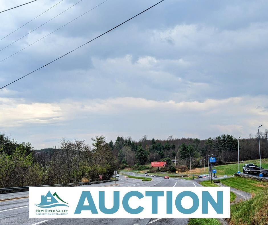 Auction Property: List price may not reflect final sales price. This property features nice open and wooded acreage in the Woodlawn VA area of Carroll County VA. Featuring +/- 6.36 acres in two adjoining tracts, this property would be a great investment or commercial property! In a great location adjoining the Johnson Chevrolet Dealership off of Carrollton Pike in Woodlawn VA. Has an old singlewide on the property of no value. Prime location for building a business or just a convenient residence. Easy commute to Galax and Hillsville VA. Very convenient for traveling to NC or WV via nearby I-77. Don’t miss your opportunity to own this prime investment property!