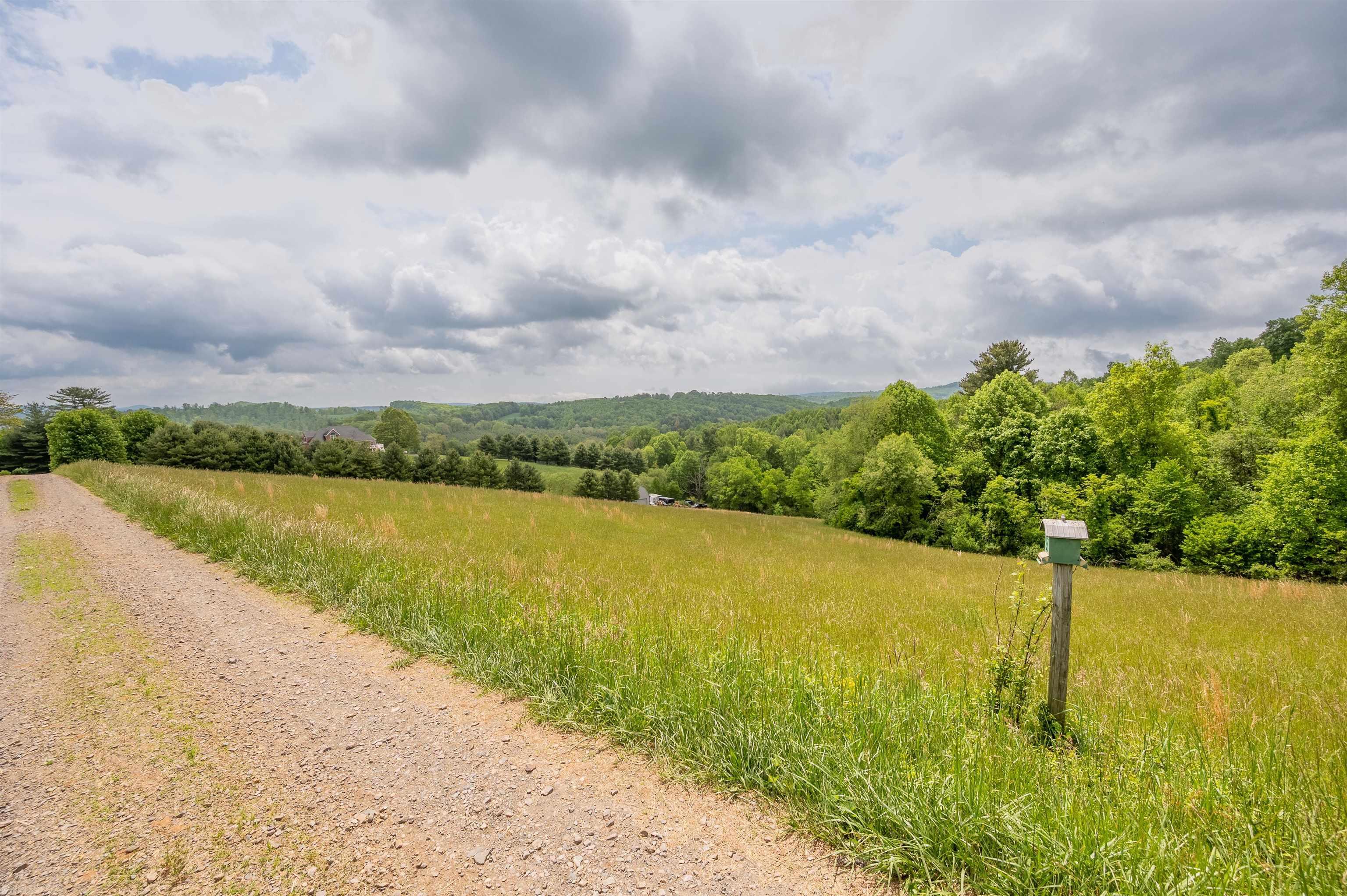 This is a beautiful spot to build a dream home, with fantastic views.  The land is situation away from the main road and offers a very quite and relaxing place to live.  For those wanting to be near the Blue Ridge Parkway and enjoy all four seasons, this is a place you will want to check out.