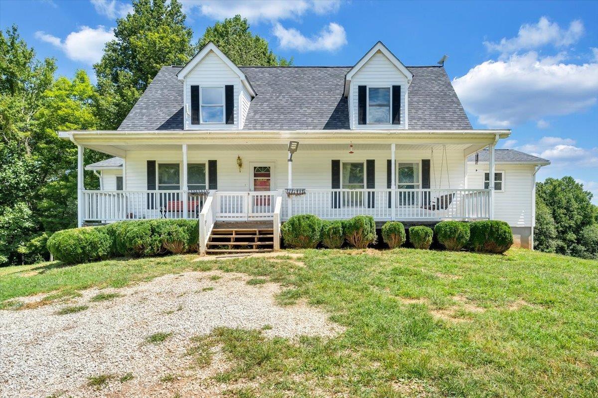 Enjoy the peacefulness of this beautiful 4 bed, 3 bath home on 24+ acres! Just 20 mins from Mount Airy, this property features a flowing creek, cleared land w/electric fence, wooded land, ATV trails, garden space, and YES, mountain views! This updated home features open-concept between the living space & updated kitchen w/stainless steel appliances & new oven, plus stone fireplace with gas logs, & dining room with beautiful views. The spacious Owners' Suite leads into updated bath with mosaic floor tiles, tiled shower, double vanity, & large walk-in-closet. Upstairs, enjoy two large rooms with en-suite full bath. This property is one of a kind with additional fully finished cabin complete with kitchen, full bath, and laundry. Additional 40'x30' barn with electricity/water is ready for animals & additional shed is great for storage. The whole house generator can keep you comfortable even in power outages & the high internet speeds are ideal for those working from home! Don't miss this!