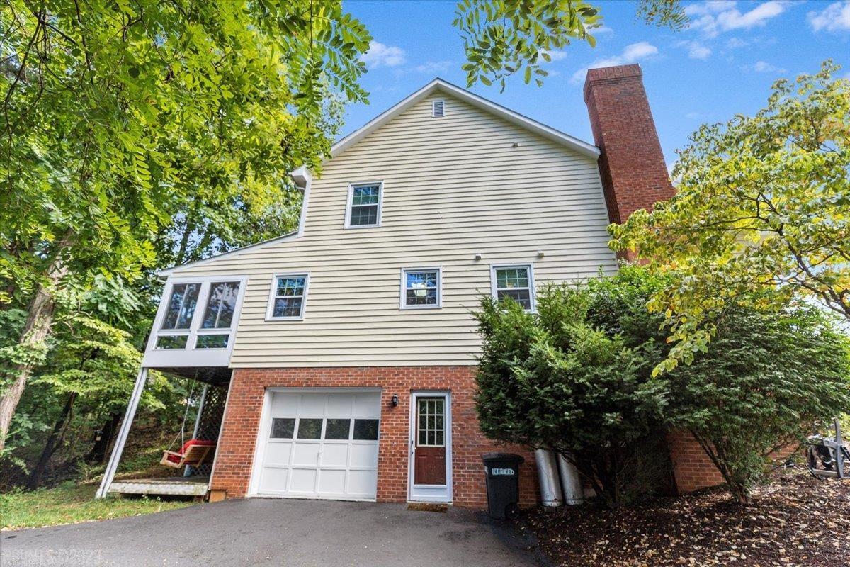 Here is a rare opportunity to own this beautiful end unit townhome in College Park with so many updates and upgrades! This home boasts a completely remodeled kitchen in 2018, with granite countertops, custom cabinets, stainless steel appliances, including a BOSCH dishwasher in 2022, and new hardwood flooring throughout the home.  Enjoy your morning coffee in the charming sunroom that was added in 2019.   New HVAC system in 2014, replace windows in 2019, vaulted ceiling, crown molding, wood burning fireplace w/gas logs, jetted tub in the master bath, and the list goes on!  This home features a nicely finished family room in the basement, and a one car garage with extra storage. The dinning room area could be made into a 3rd bedroom.  This extremely attractive home in the heart of Radford is in a super convenient location that is near schools, shopping, grocery, and dining.  This one will not last long!  Call and make your appointment today!