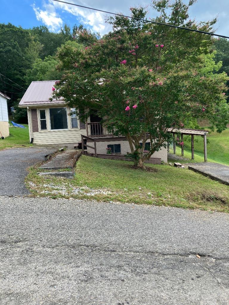 Charming 3 bedroom 2 bath home recently updated.  House has a brand new AC/ central heat , new water heater, ceiling fans. Granite countertops with under mounted sink and tile backsplash. Laundry hook up on main floor. Beautiful decks to enjoy the outdoors with plenty of parking.