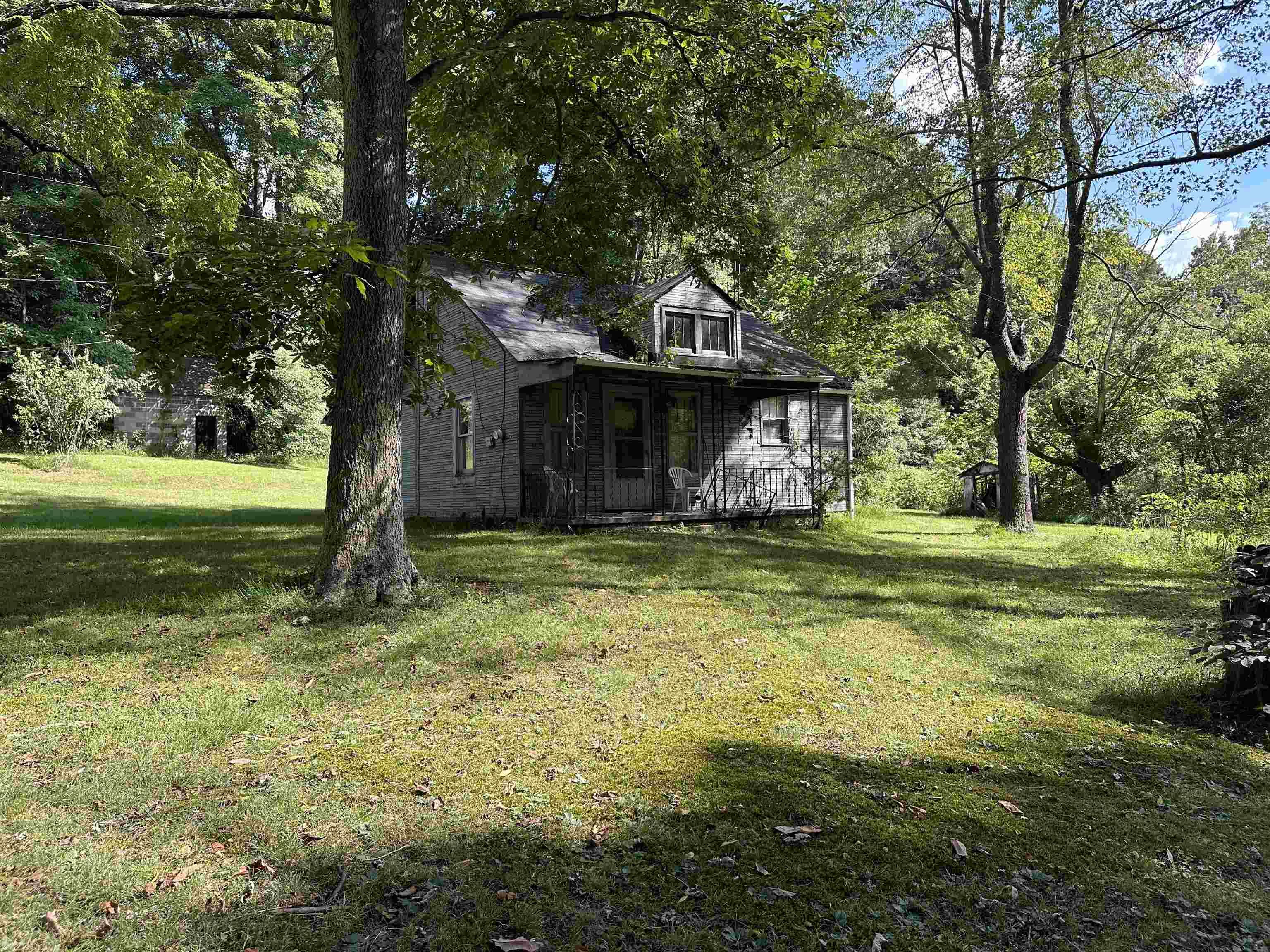 Welcome to 171 Deaton Lane! This handy persons special is located on 2.5 acres in the beautiful Giles county. This cottage presents with 2 bedrooms and full bath on the main floor. Level and secluded/private large yard.  This property presents with an extremely large detached workshop with power. With some TLC this is an amazing opportunity for an investment opportunity! Don't let this one pass you by!