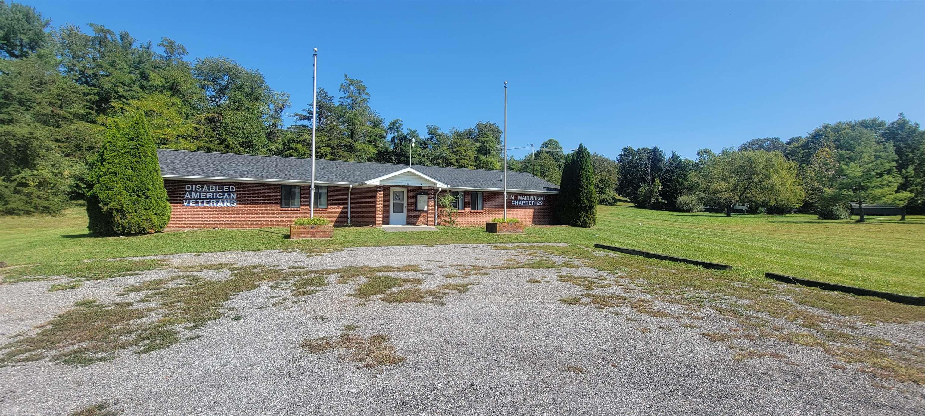 This former lodge, nestled on two acres of agricultural land, presents an exceptional opportunity for investors and homeowners alike. With its rustic charm and room for expansion, this property is perfect for crafting your dream single-family home while offering potential for future investment growth.