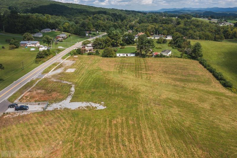 We are thrilled to present this premier commercial property for sale! Located strategically just off Interstate 81 at Exit 84, this expansive property in Max Meadows, VA is a game-changer for businesses. There is no zoning or restrictions. Whether you are an investor, developer, or business owner, this property is your ticket to a prosperous future! This 18.419 acre tract of land features great visibility from E Lee Hwy. Public water and sewer connections are in place, streamlining your business development process. 3-phase power is available on-site. Three commercial entrances have been approved by VDOT to ensure easy access to your business. Property would be great for a truck stop, travel center, retail hub, manufacturing, or development.