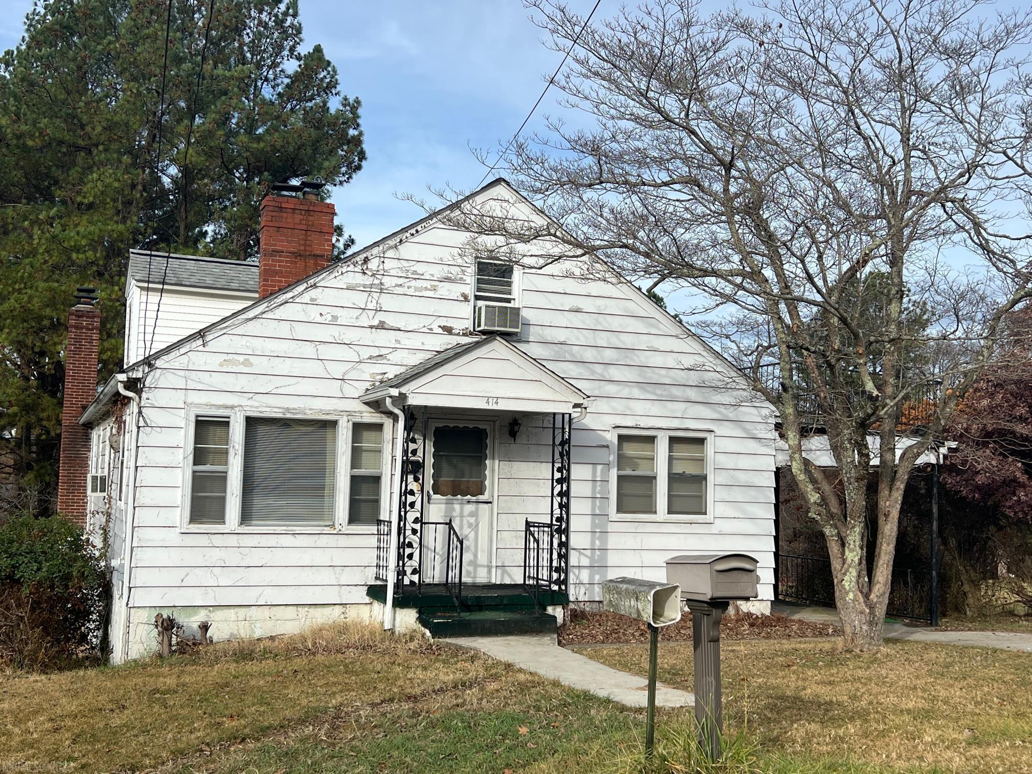 2,363 Sq. Ft., 4 BR/2.5 BA -- Good solid bones and amenities with this home - just needs some TLC. Lots of living space and storage. Great workshop (24X12), vinyl sided, electricity. Recent survey. Roof 6 Years old. New sump pump. All 3 fireplaces have been woodburning, one with insert. Living area in this home is deceiving from looking at the front!! Great investment as a rental or for your own residence!!! Property being sold "AS IS" - Seller will make no repairs.