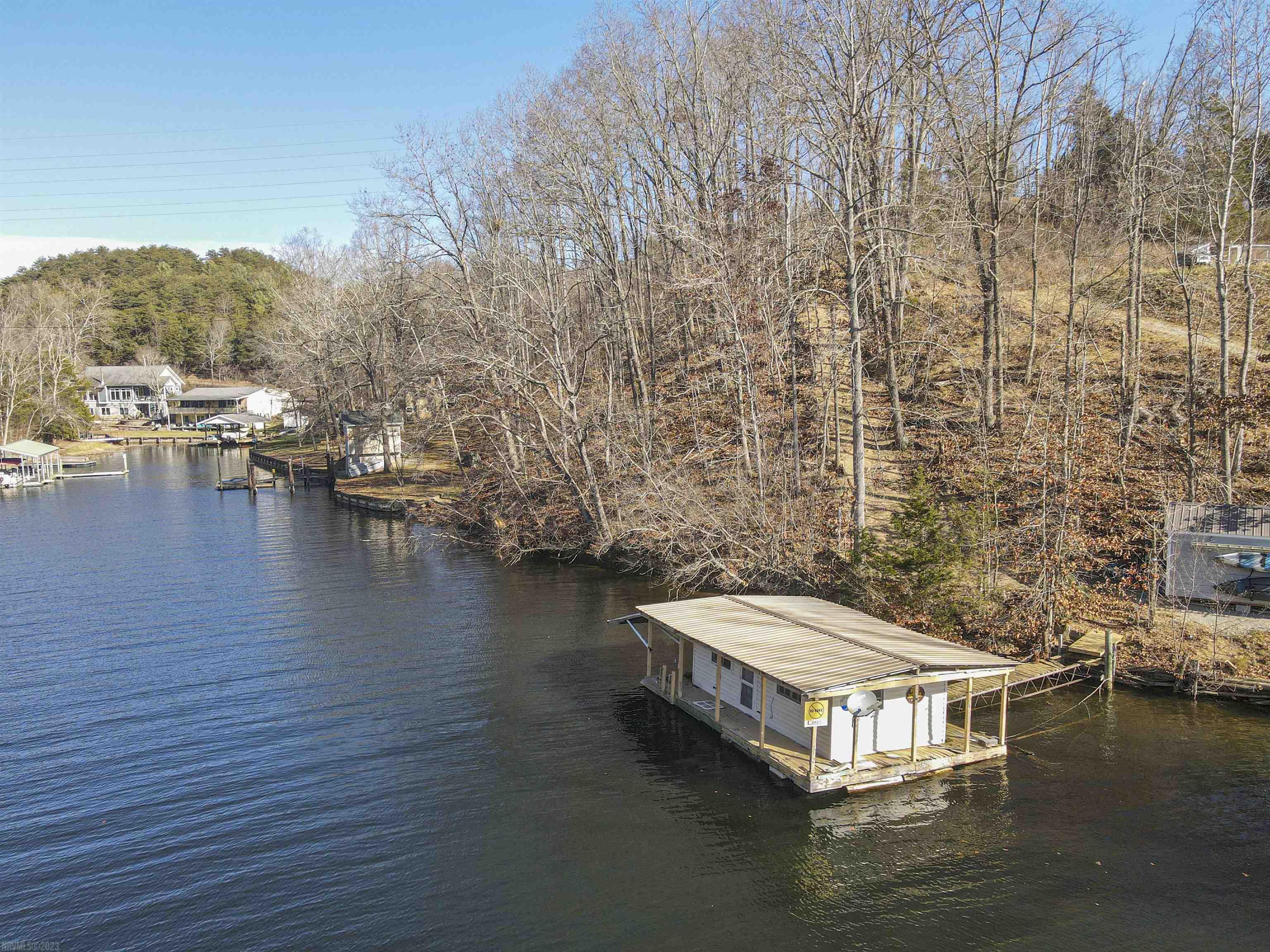 Amazing views from this Claytor Lake waterfront lot! Only minutes from I-81, this lake location is convenient and highly sought after. This secluded lot offers 35 feet of waterfront with deep water, deeded boat launch access just one lot over and views that will knock your socks off! County zoning allows for manufactured homes (buyer to verify) and there are no covenants, restrictions or HOA. This type of lot on Claytor Lake is hard to find. Newer survey on file with a permit for a conventional, 3 bedroom gravity septic system. Come take a look...you won't want to leave!