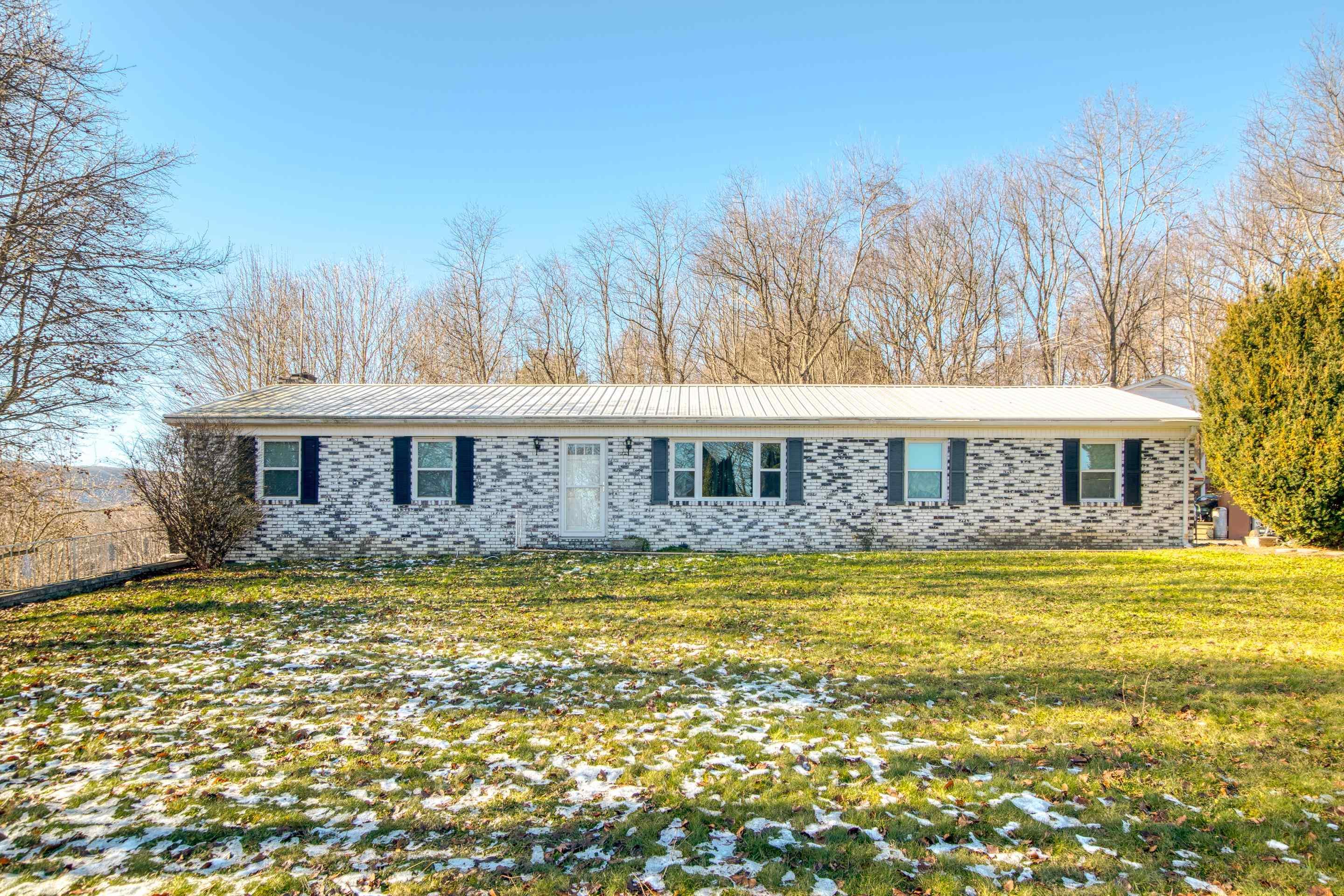Discover the potential of 387 Hummingbird Hill in Tazewell, VA! This 3-bedroom, 1-bathroom home is competitively priced at $175,500, presenting an excellent investment opportunity. With a spacious interior, this property offers flexibility for a growing family or the chance to create dedicated workspaces. The neighborhood's convenience adds value, with proximity to local amenities, schools, and parks. Take the first step toward making 387 Hummingbird Hill your own. Schedule a viewing to explore the possibilities and envision the transformation that could turn this house into your dream home.