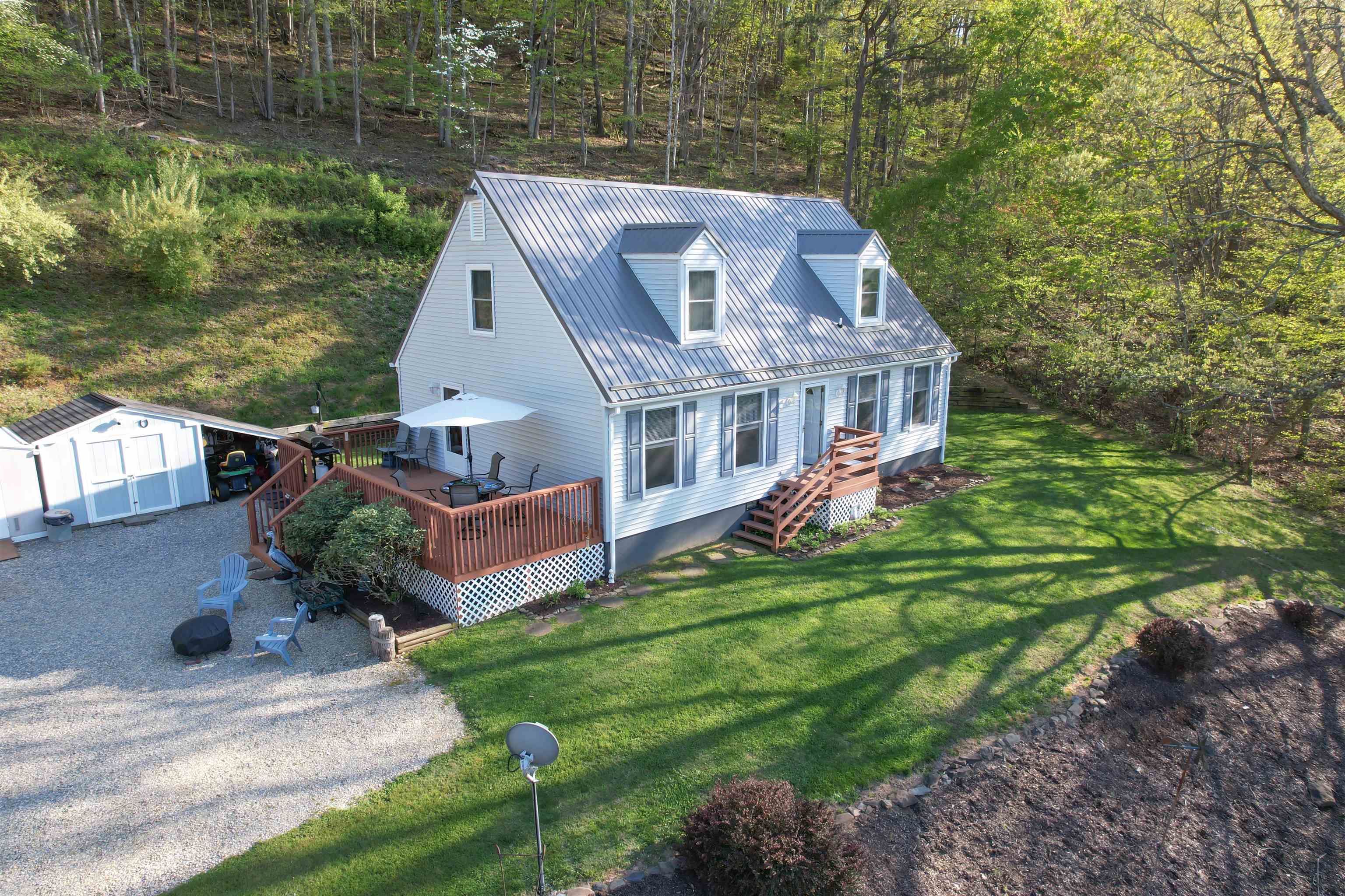 Open House Sunday 12:00-2:00: Escape to rural bliss at 7580 Booker Branch Rd. in Radford, VA. This charming 4-bed, 2-bath farmhouse sits on 1.5 acres of serene countryside, offering both tranquility and convenience. With a new metal roof, new heat pump, new insulated tilted windows upstairs, updated kitchen appliances, and a flexible layout, this home is as practical as it is picturesque. Enjoy entertaining on the spacious back deck or relaxing in the peaceful surroundings. Featuring a potential master suite upstairs with a jetted tub, and a master bedroom on the first floor, this home offers versatility for your lifestyle. A well-built retaining wall ensures proper drainage, and the school bus stops conveniently at the bottom of the driveway.