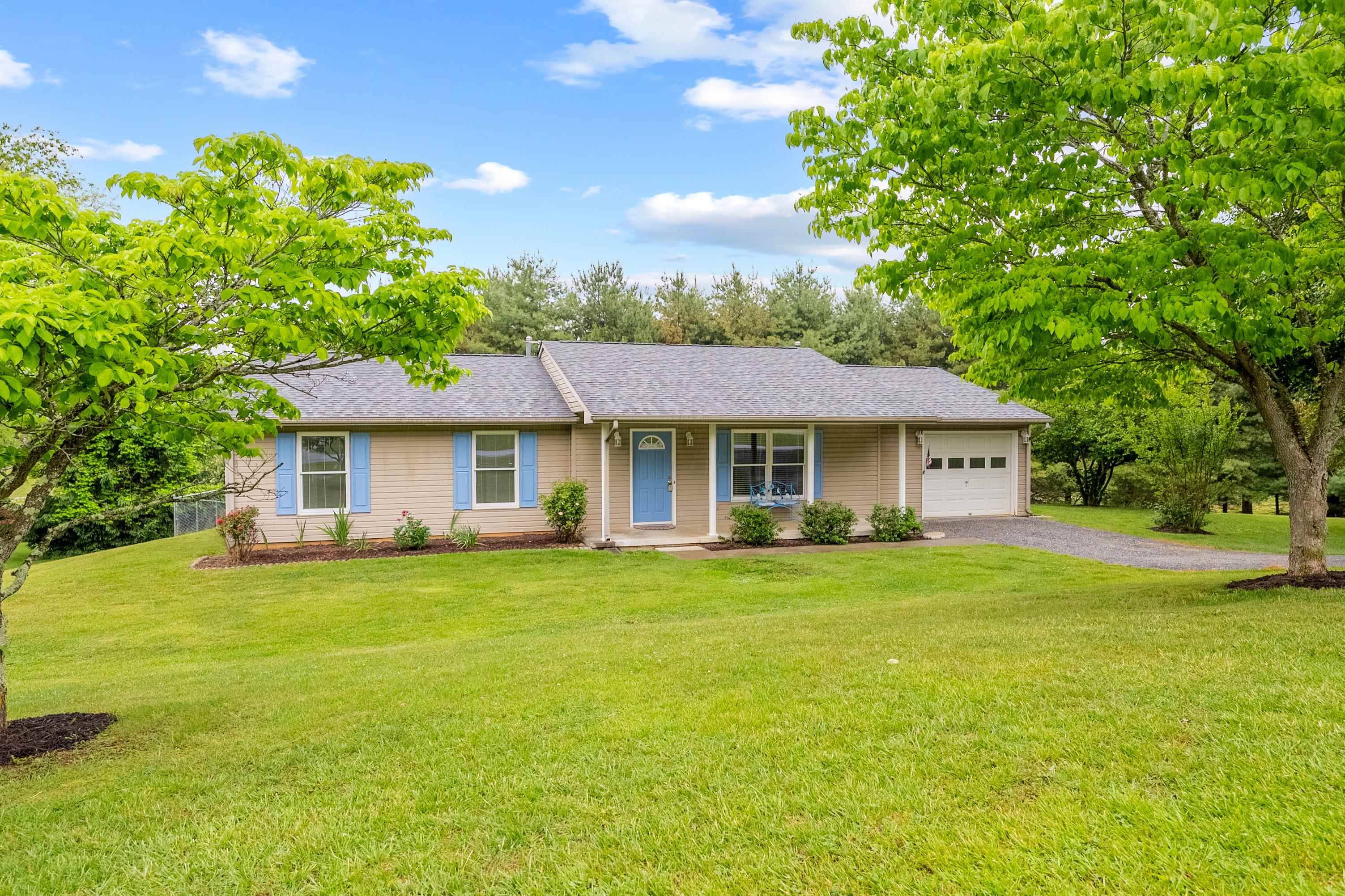 Come home to Cameo Lane in Blacksburg perfectly situated on over a half acre flat lot that is partially fenced.  Enjoy a quiet cul-de-sac street with pastoral views and nice rural neighborhood setting less than 10 minutes to downtown Blacksburg and quick commute to VT.  There is plenty to enjoy inside this charming one level ranch home boasting 3 bedrooms, 2 full baths, new flooring and fresh paint.  Garage offers convenience directly into the home.  Come See and finally have room to breathe within a short drive to the conveniences of Blacksburg!